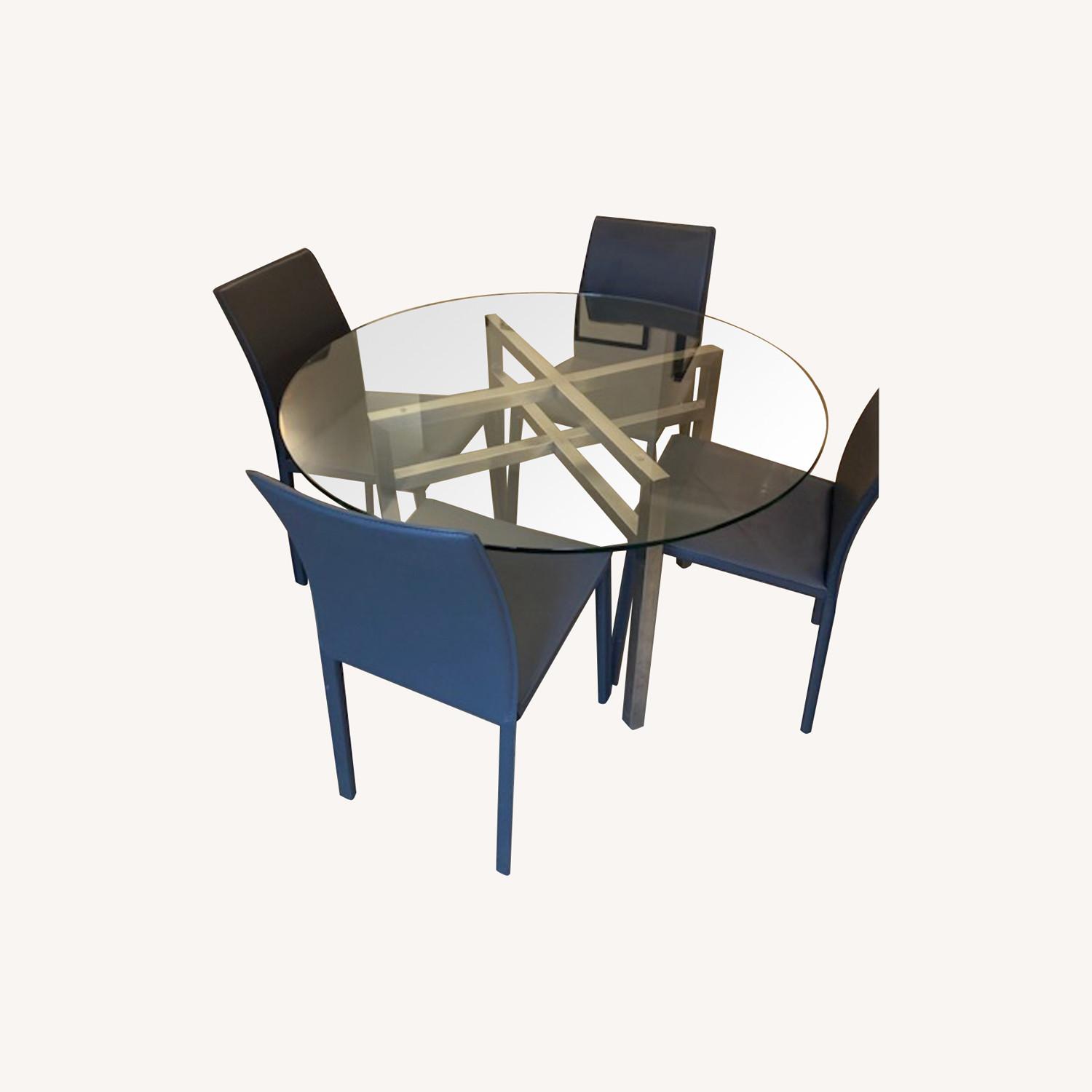 Glass Dining Table with 4 Leather Chairs - AptDeco