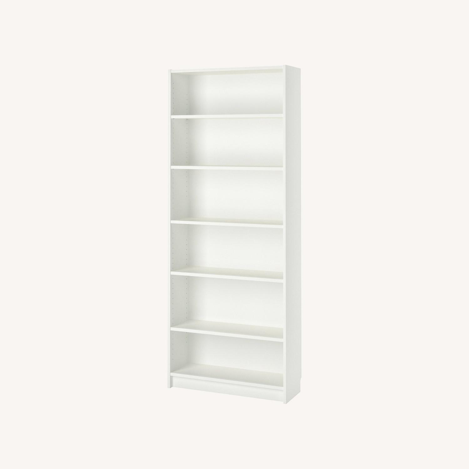 IKEA Three Identical White BILLY Bookcases - image-0