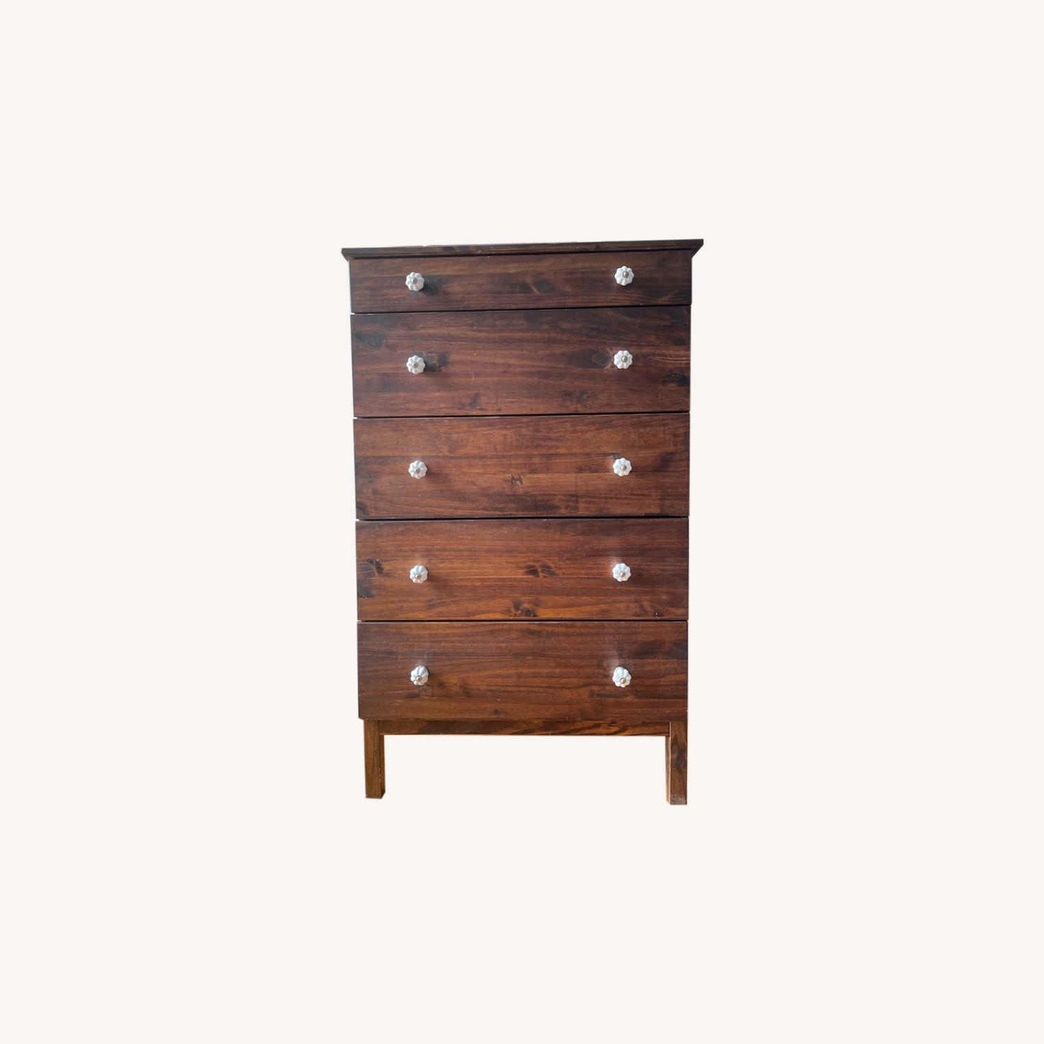 Dark Wood Dresser with White Knobs AptDeco