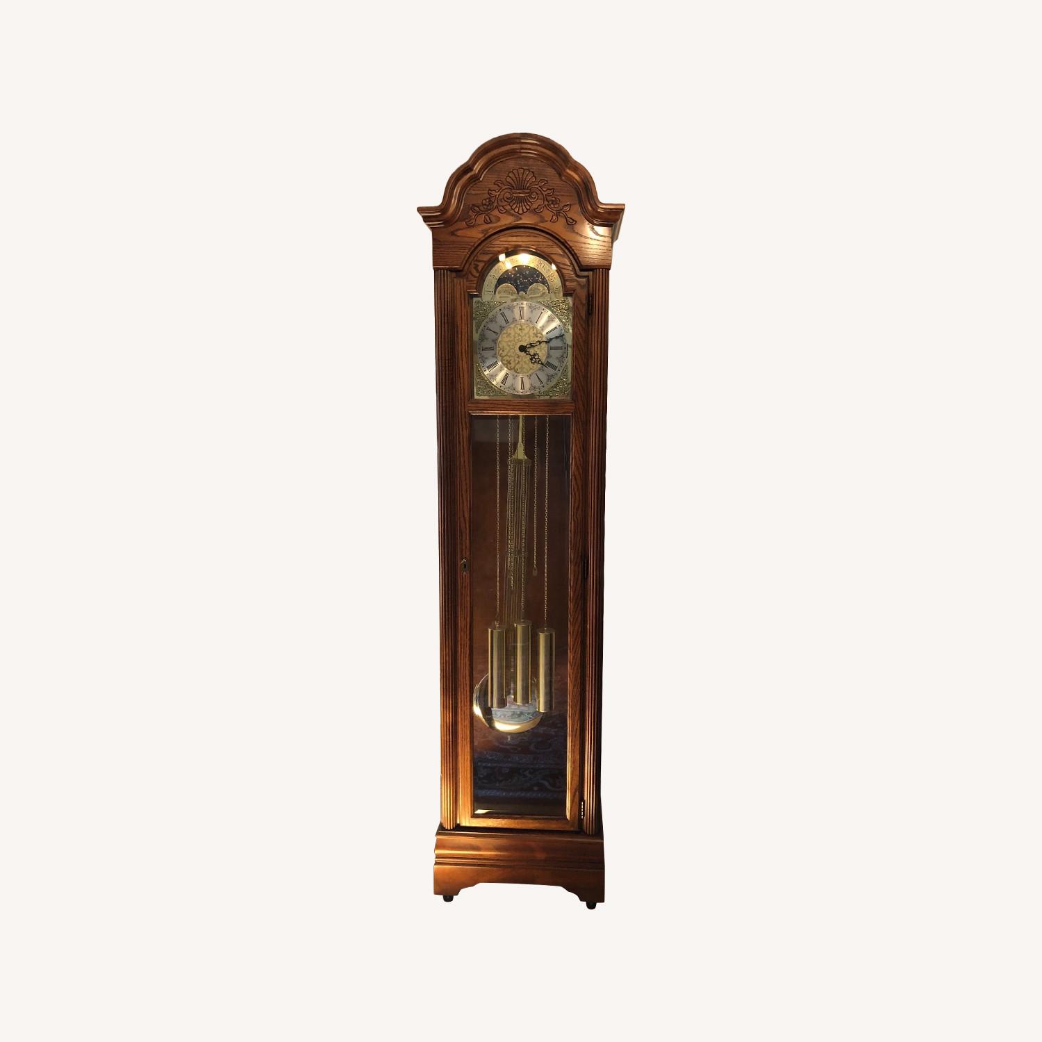 Howard Miller Grandfather Clock AptDeco howard-miller-grandfather-clock-aptdeco