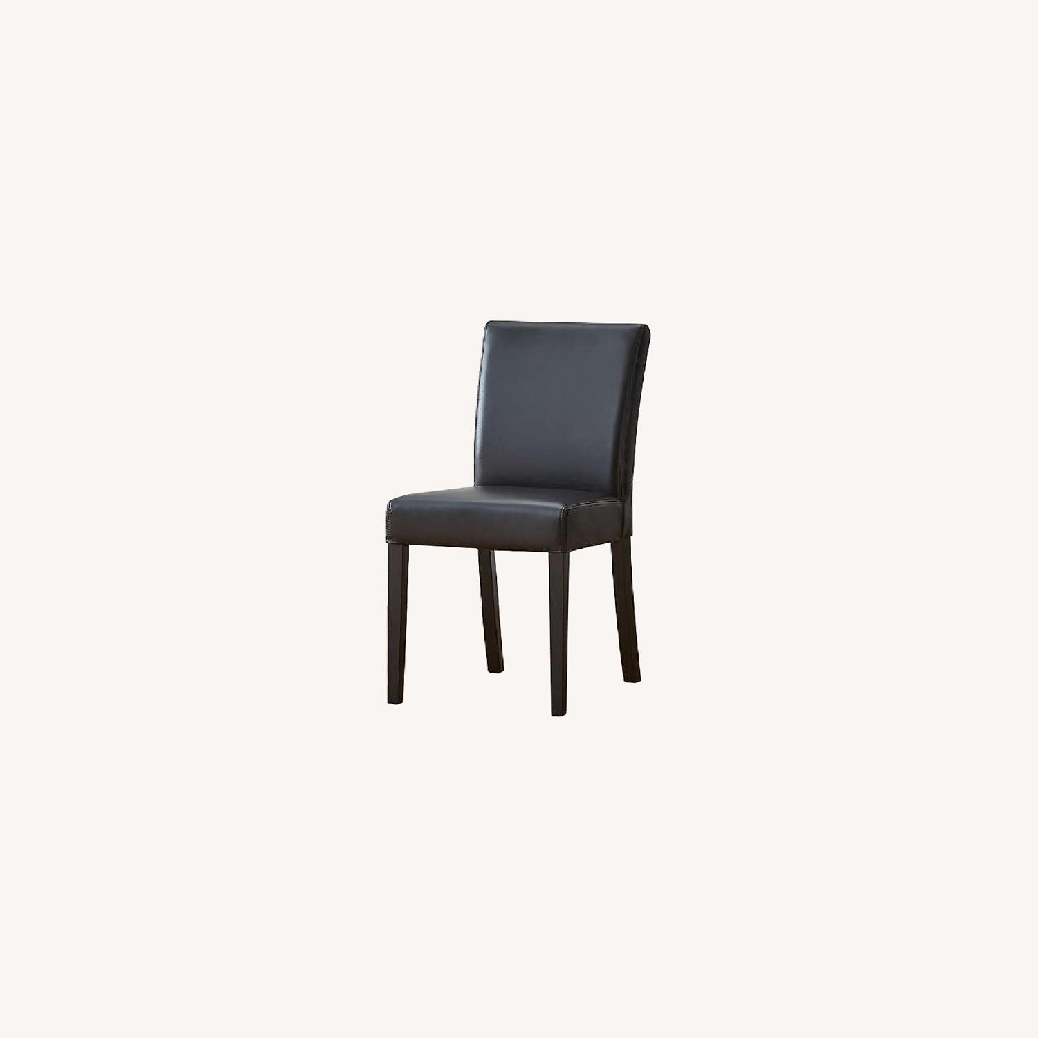 Crate and Barrel Lowe Onyx Leather Dining Chairs AptDeco