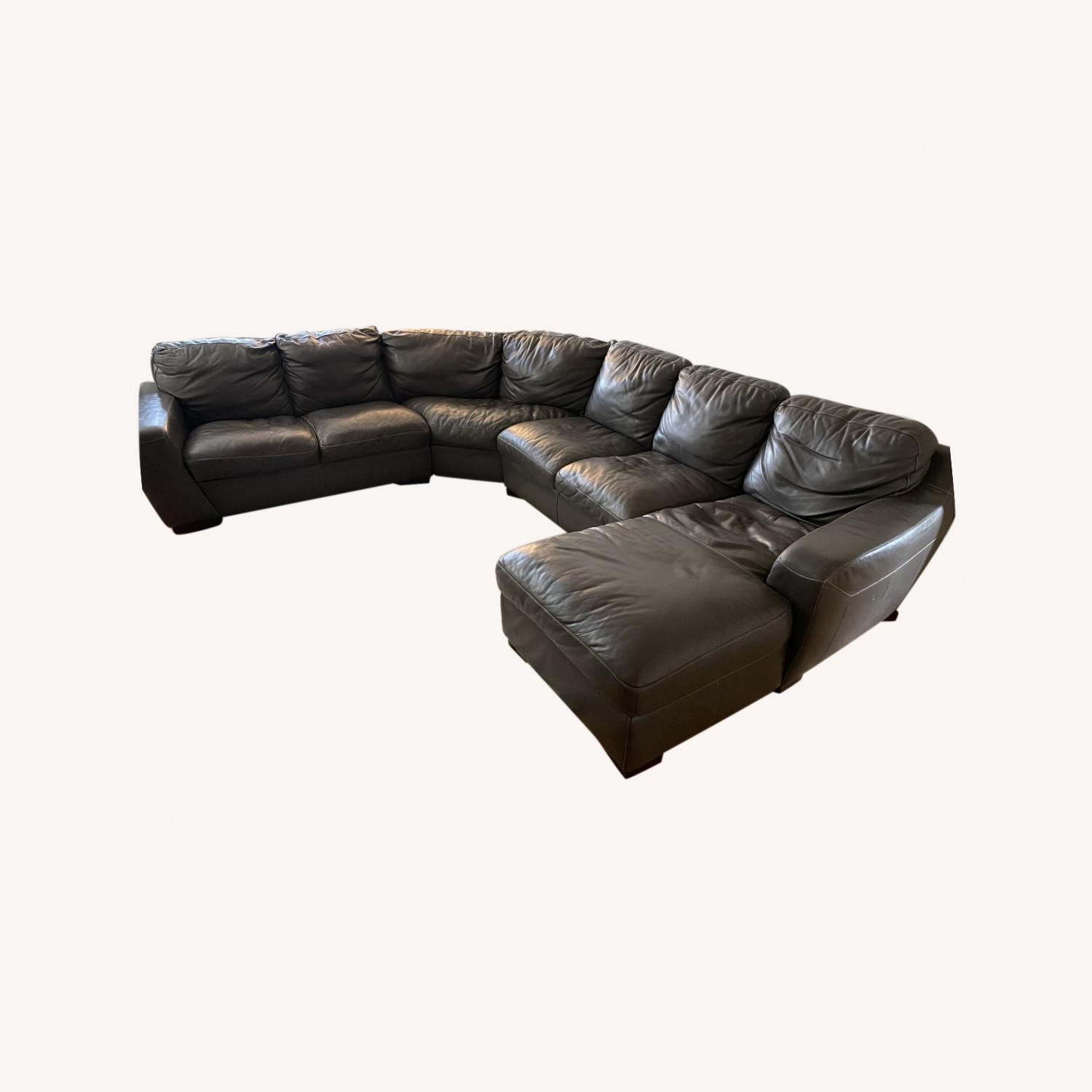Raymour and Flanigan Leather Sectional Sofa AptDeco