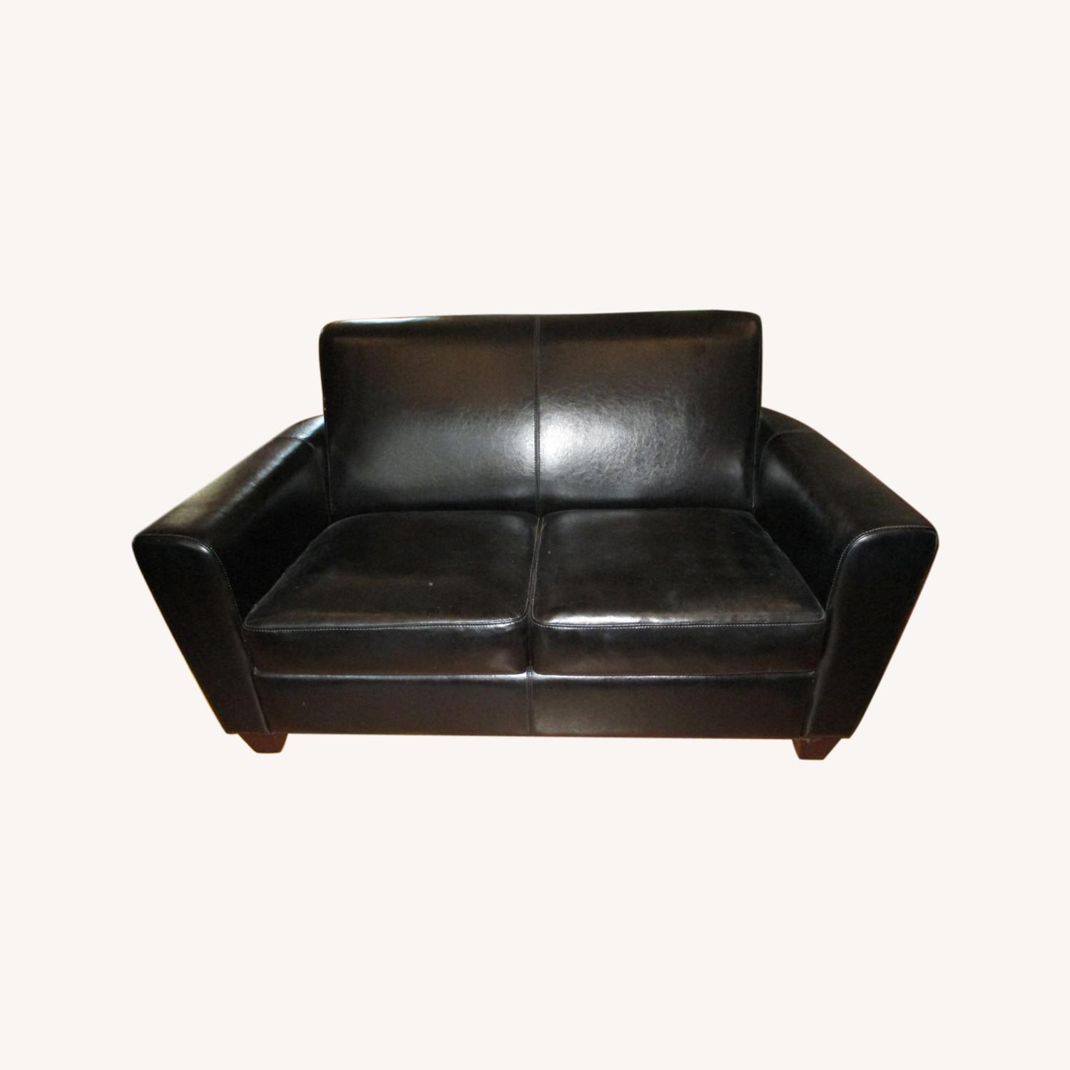 Black Leather Upholstered Loveseat - image-0