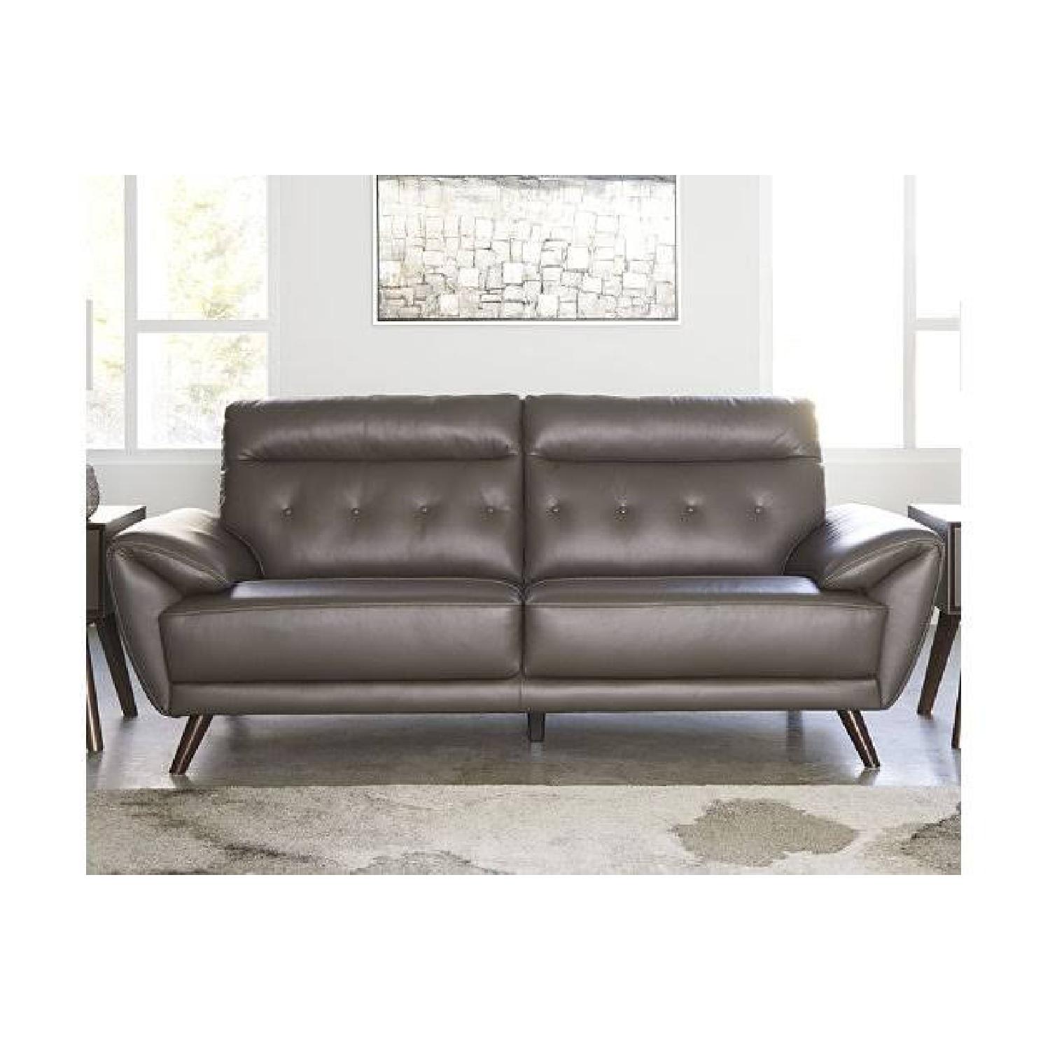 Ashley Furniture Sissoko Leather Gray Sofa - image-6