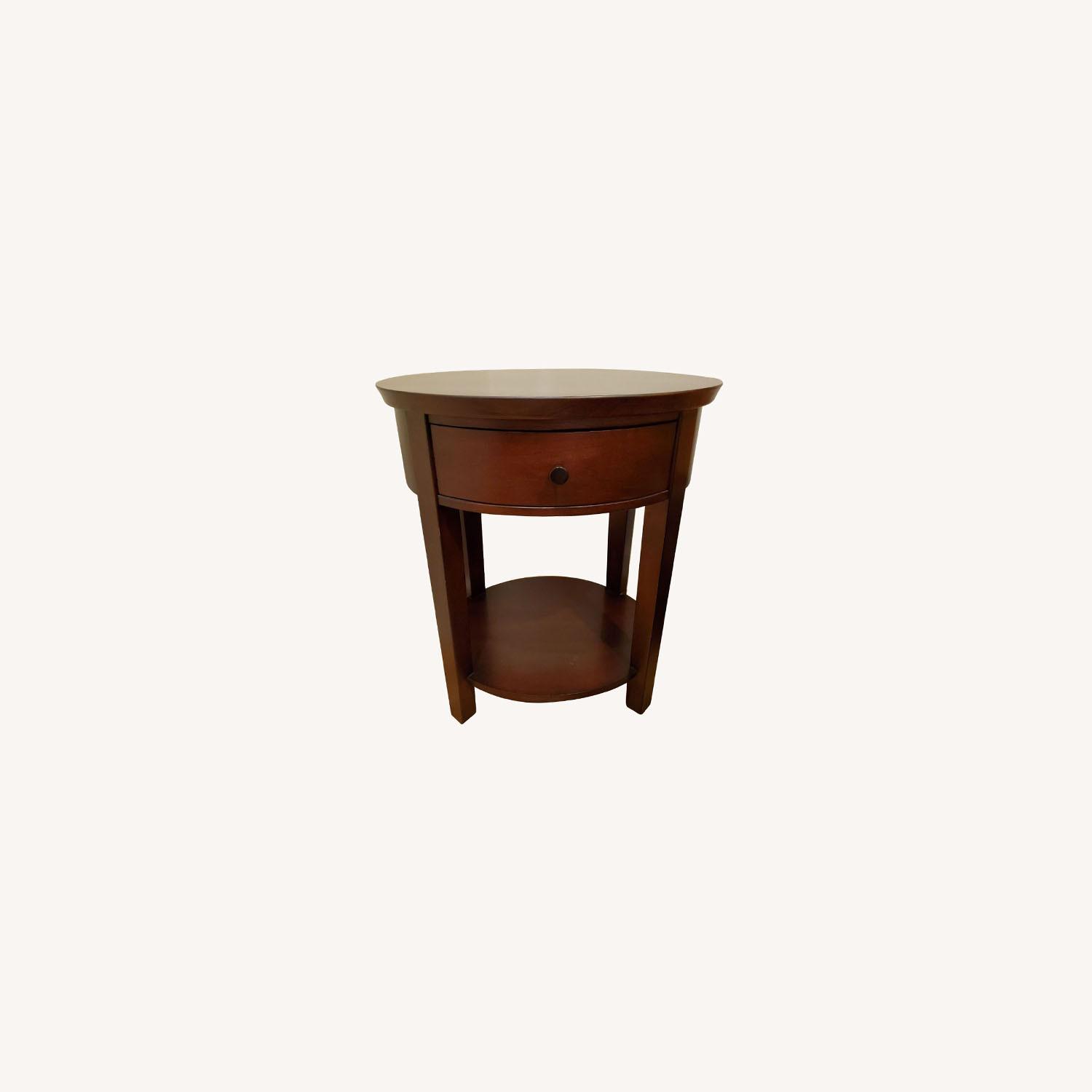 Pottery Barn 24 inch Oval Dark Wood Nightstand - image-0