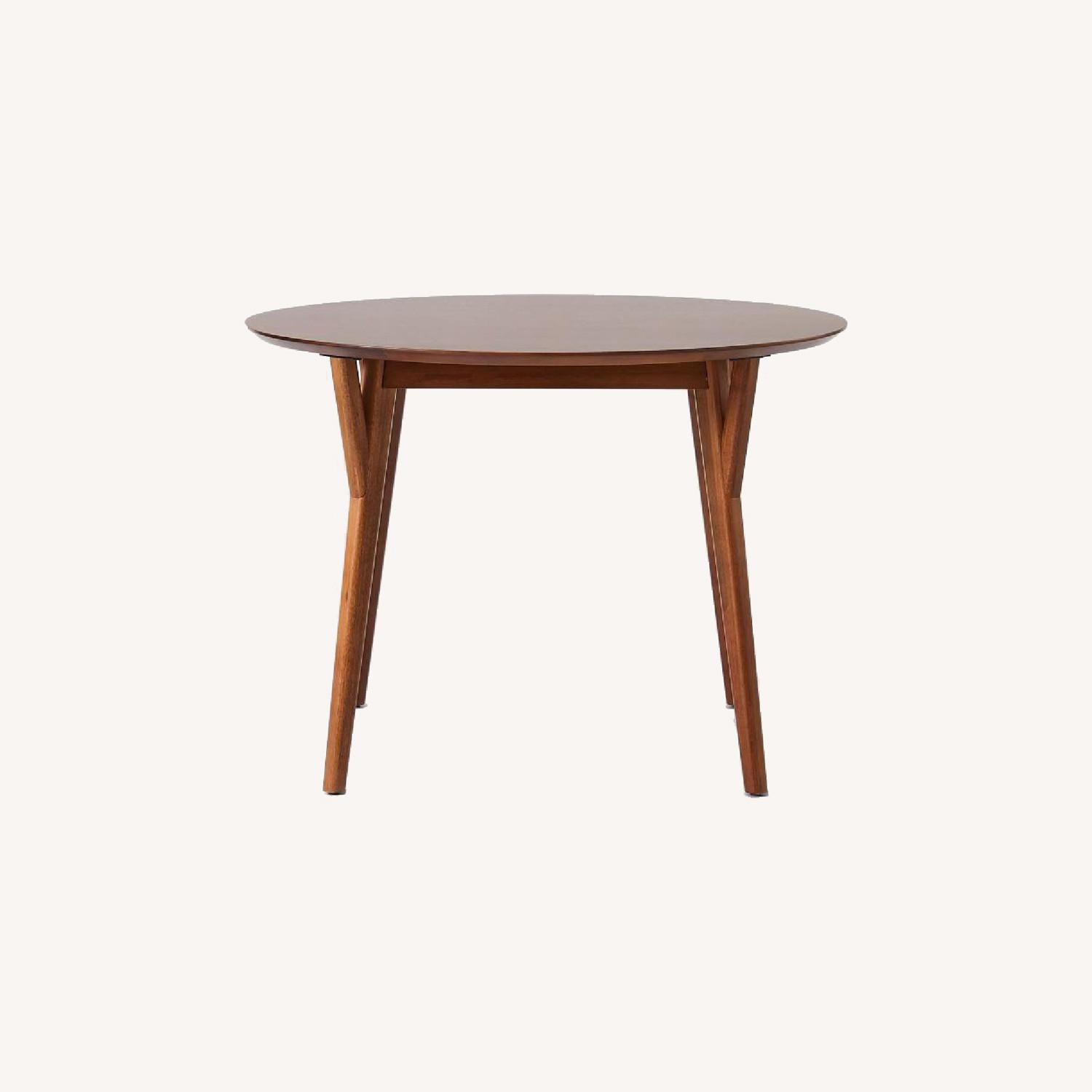 West Elm MidCentury Round Expandable Dining Table AptDeco