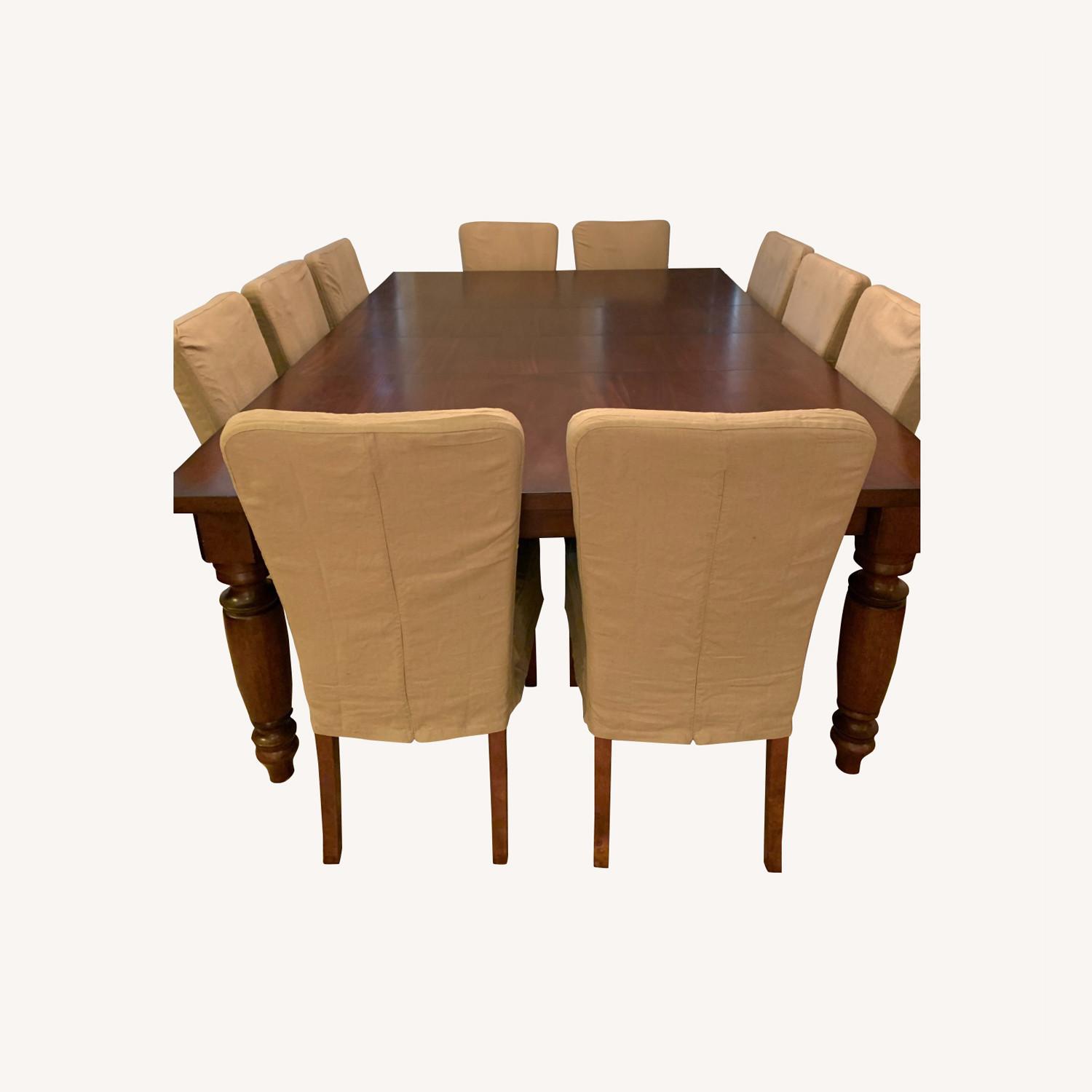 Pottery Barn Grand Dining Table with 12 Chairs AptDeco