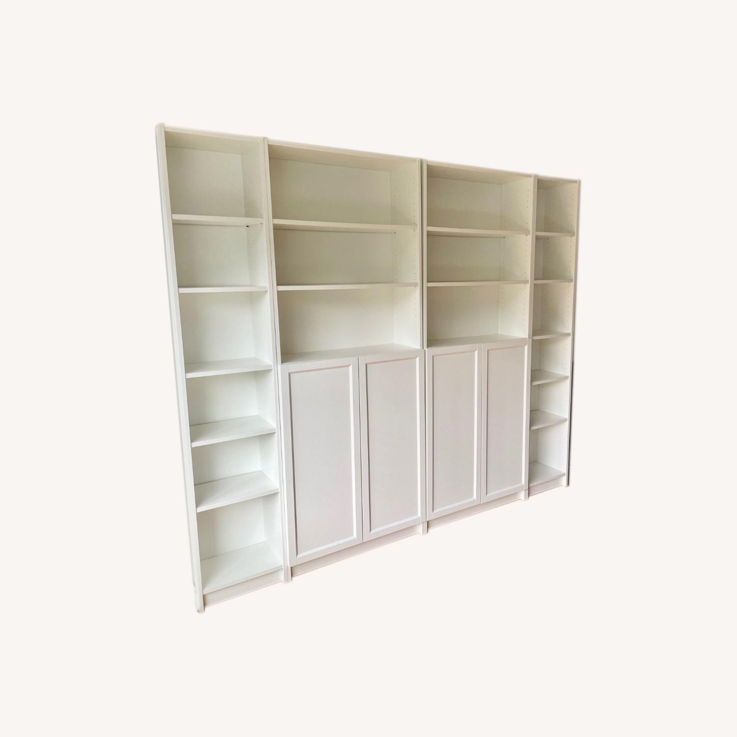 IKEA White Billy Bookshelves with Doors AptDeco