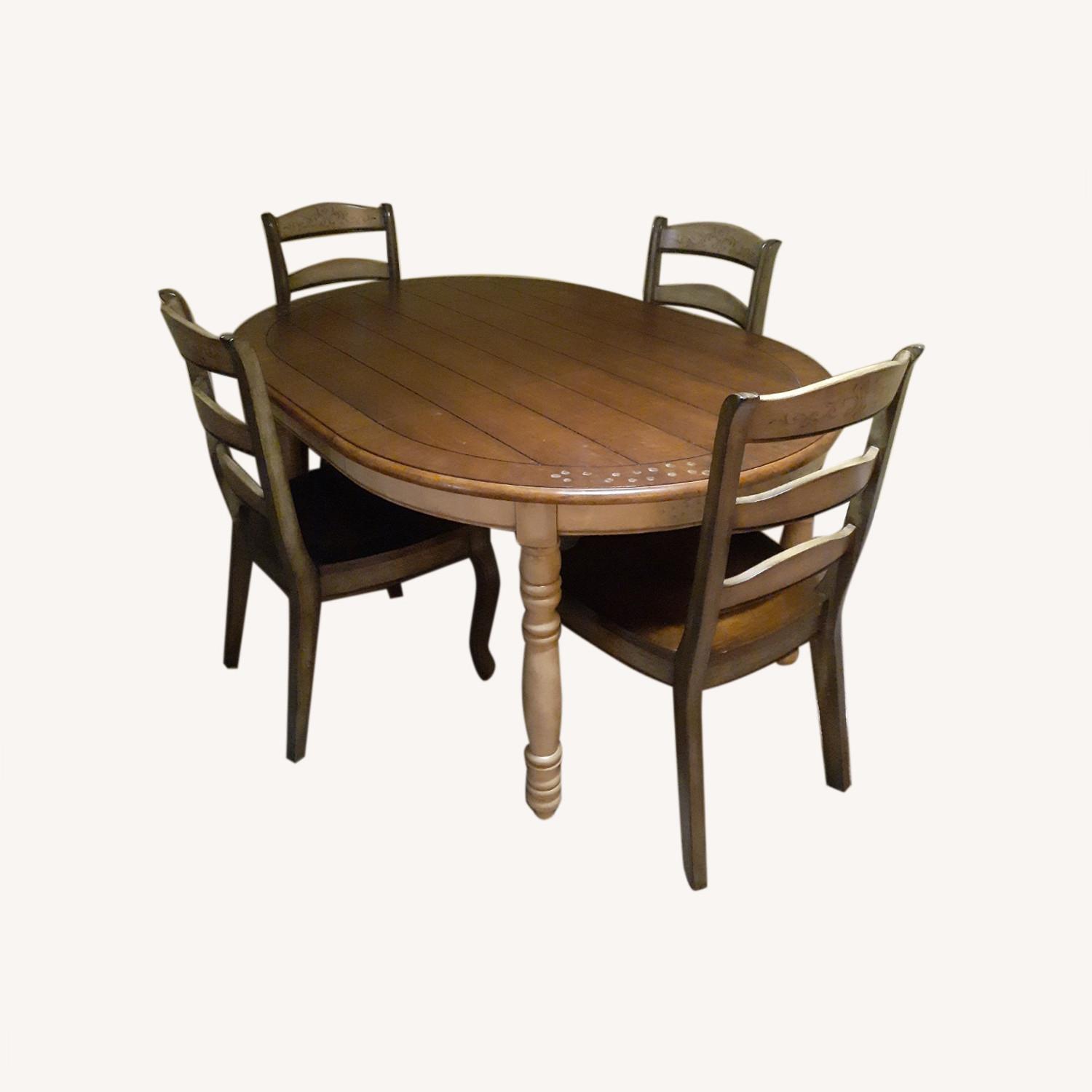 Farmhouse Wood Table and Four Chairs - AptDeco
