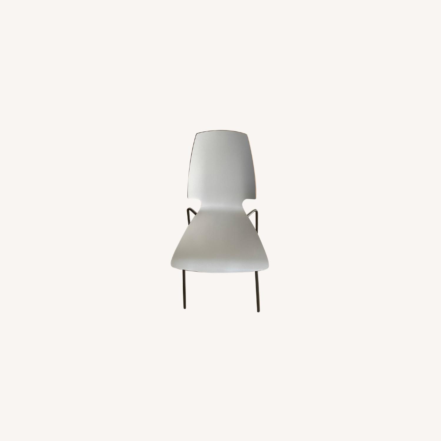 IKEA Modern Stackable White Dining Chairs (set of 4) AptDeco