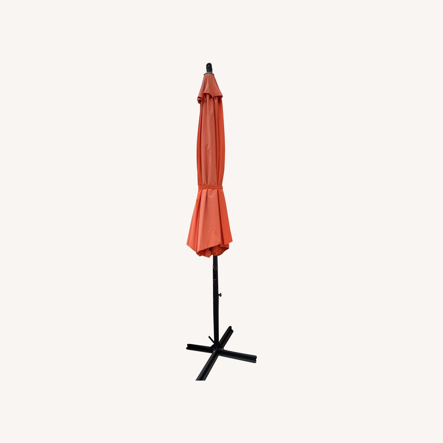 Orange Cantilever and Vertical Umbrella Set (2) AptDeco
