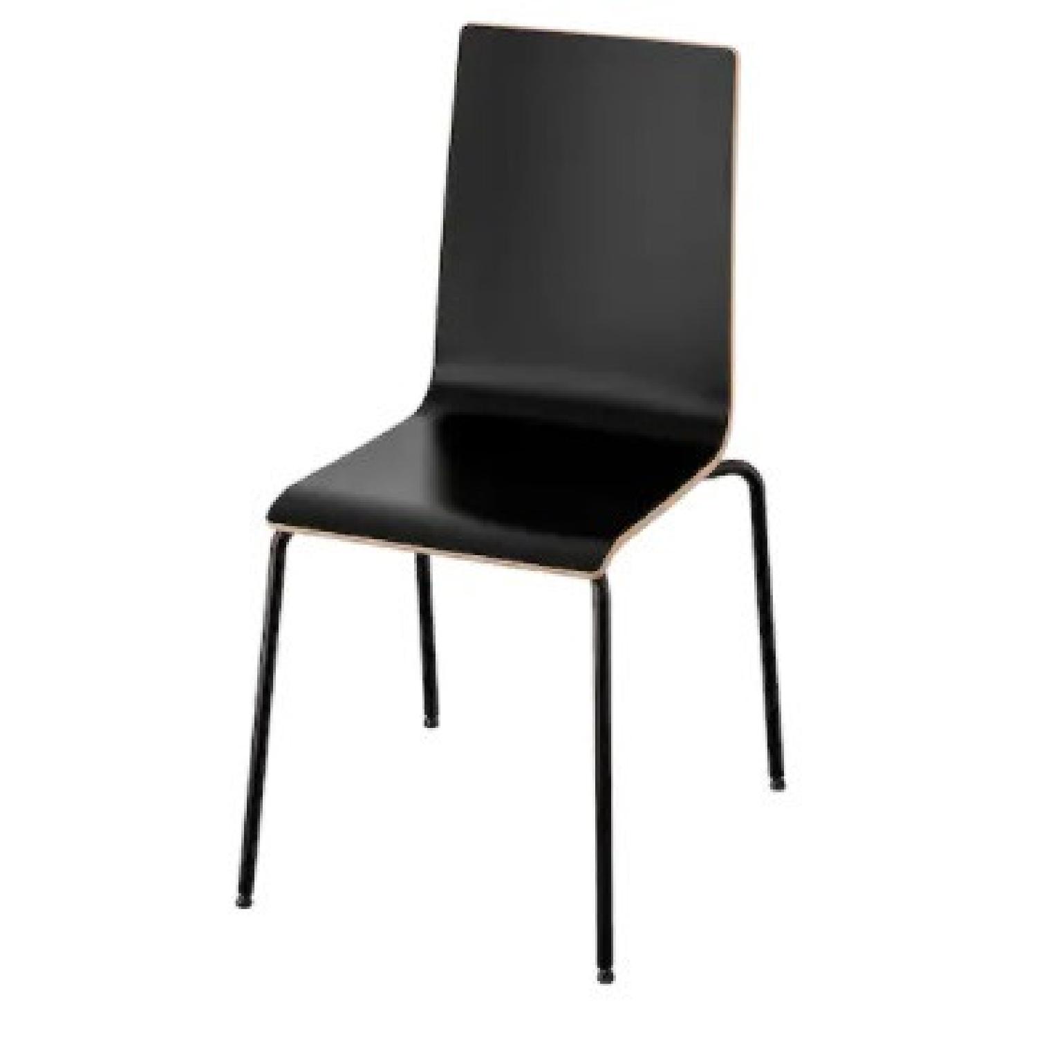 4 IKEA Martin Black Stackable Chairs - AptDeco