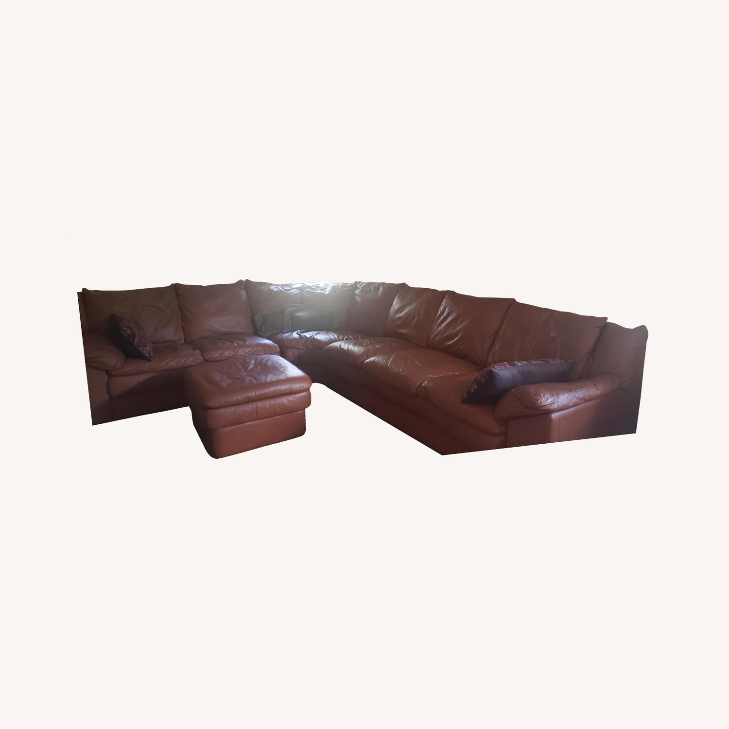 Macy's curved 3piece Sectional Rust Leather AptDeco