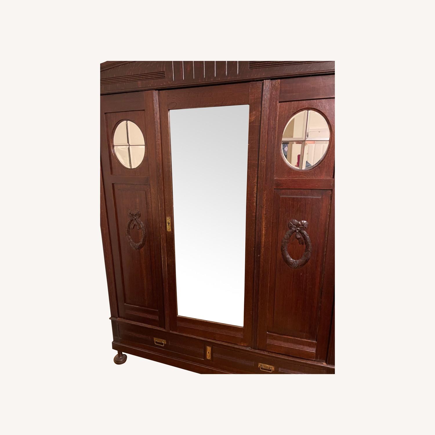 Mirrored Armoire with Drawer and Shelves AptDeco