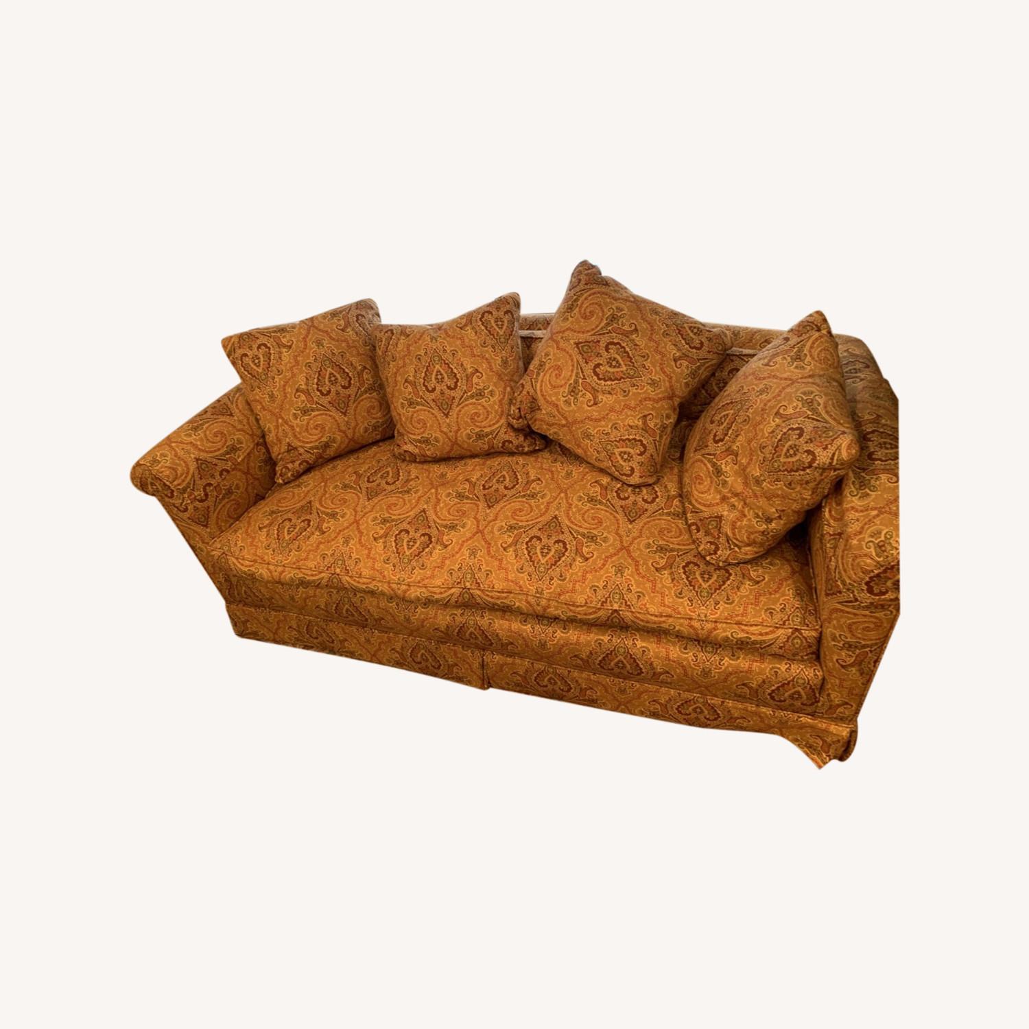 Orange-Patterned Three-Seater Couch - image-0