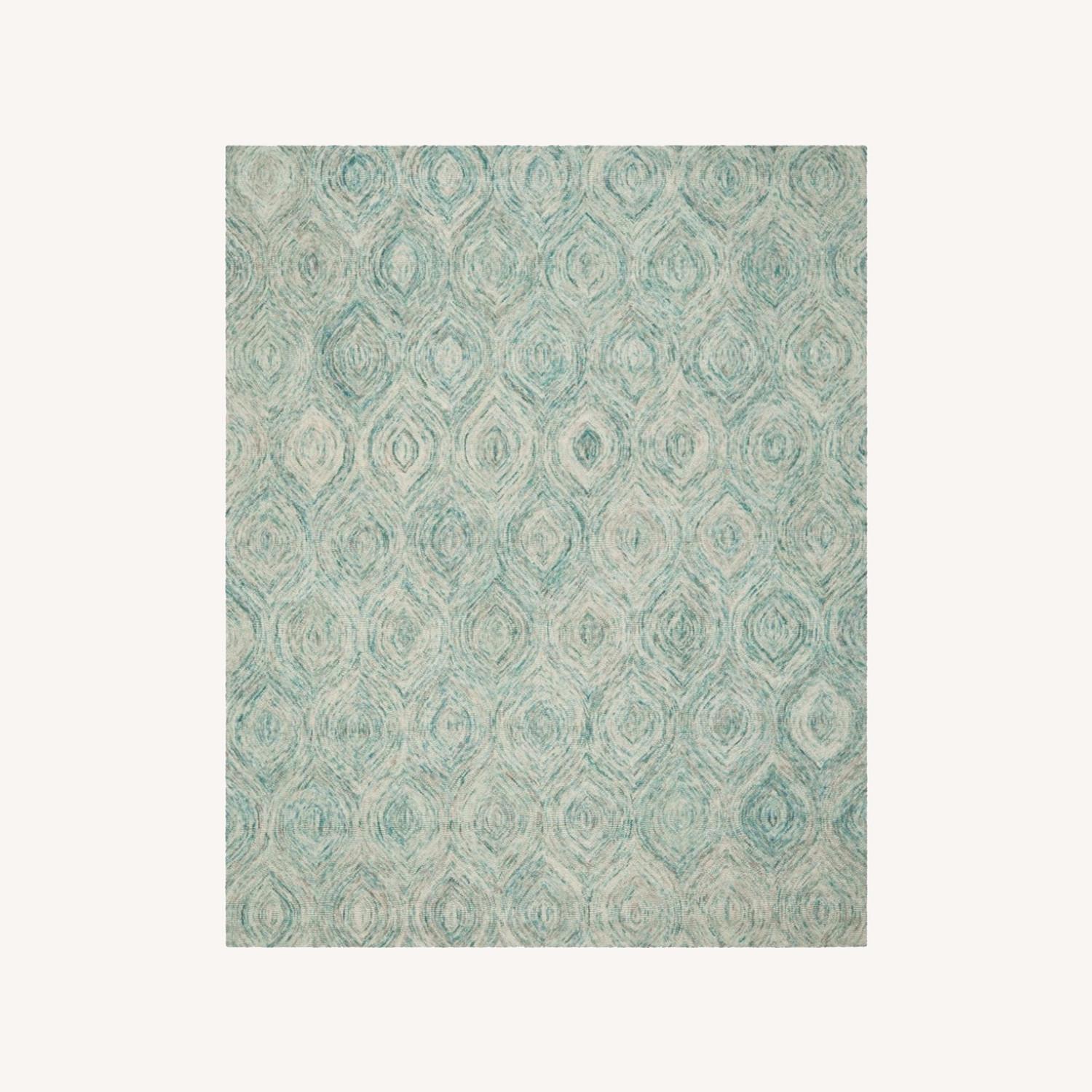 Safavieh Handmade Ikat Seafoam Wool Rug AptDeco