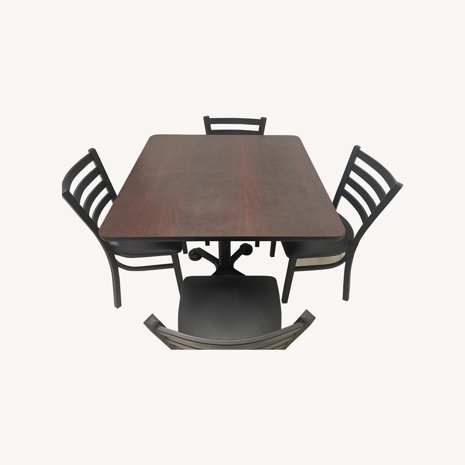 Lowe's Black Top/Black Vinyl Seat Dining Room Set AptDeco