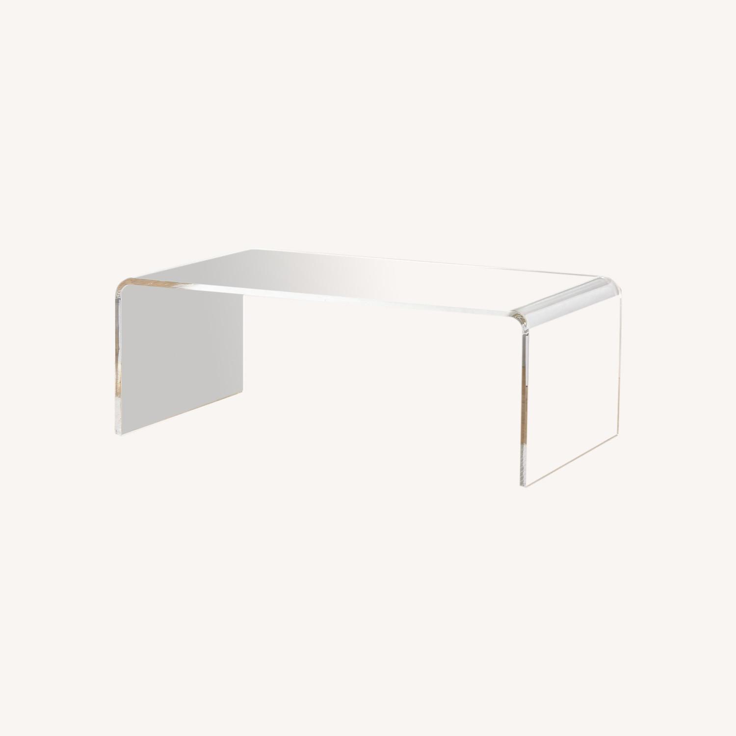 CB2 Peekaboo Acrylic Coffee Table AptDeco
