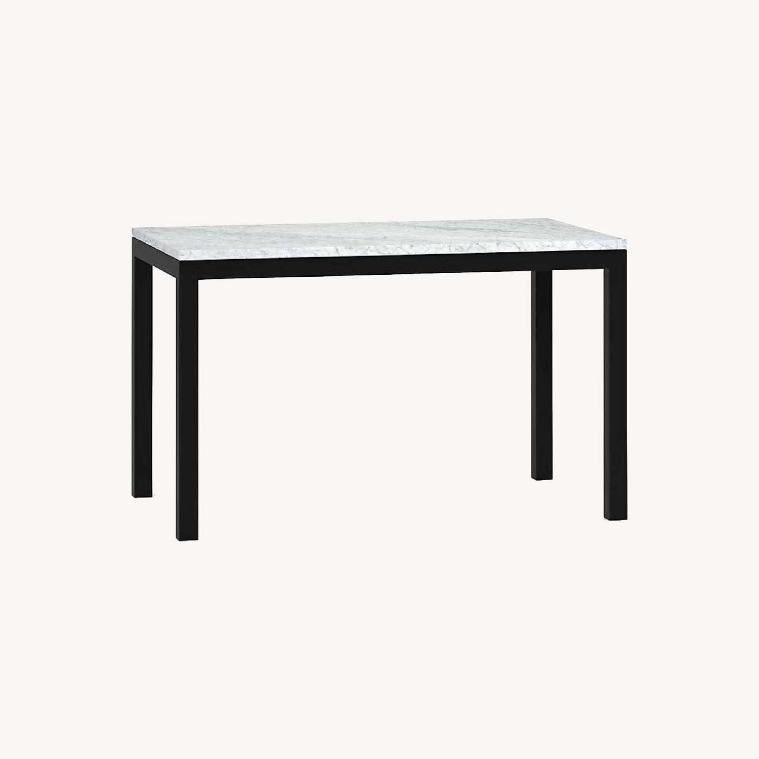 Crate and Barrel Parson white marble dining table AptDeco
