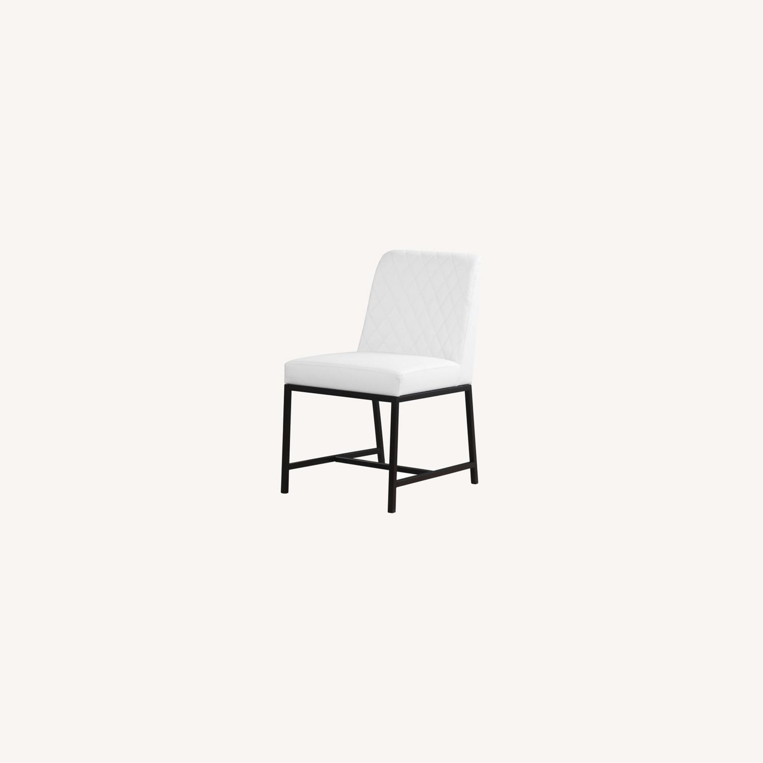Dining Chair In White Faux Leather & Black Legs AptDeco