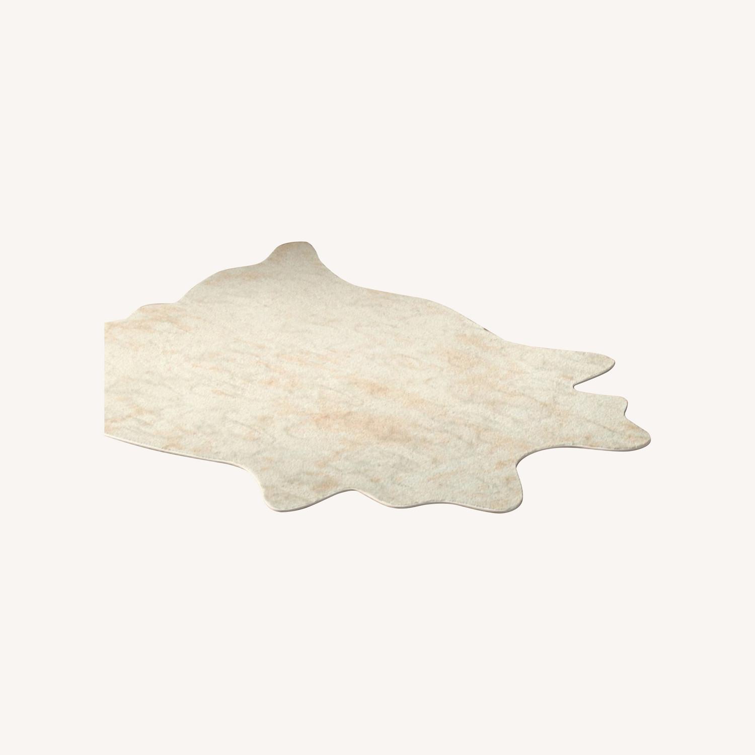 Wayfair Faux Cowhide Area Rug AptDeco