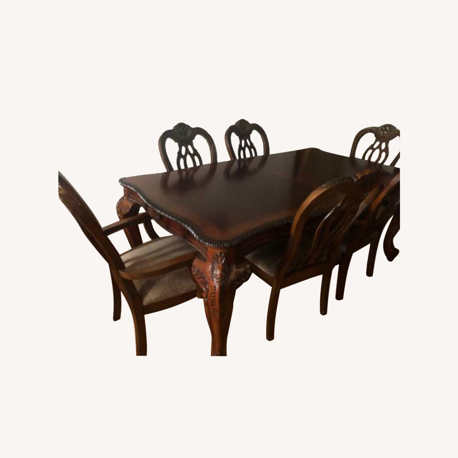 Dining Table with Extension and Five Chairs - AptDeco
