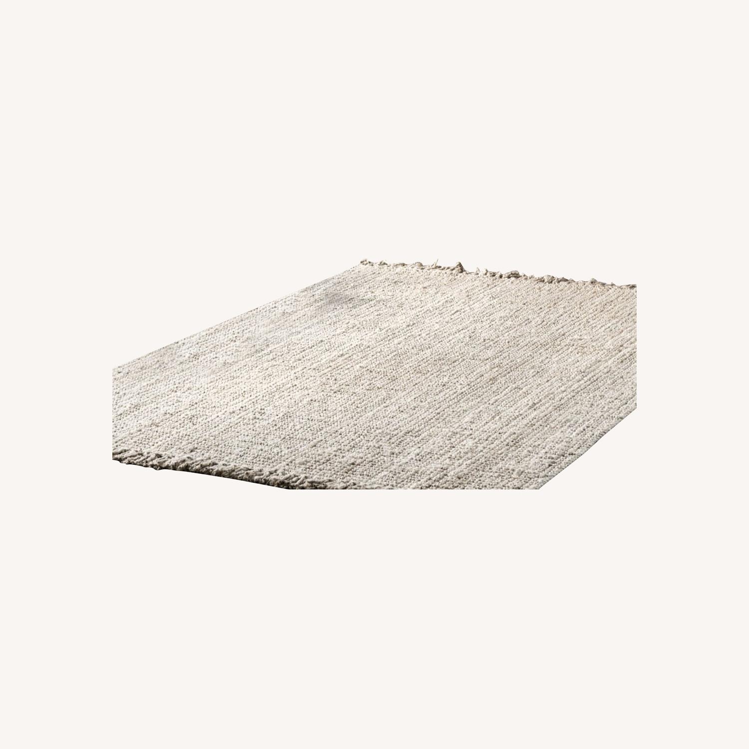 Off White Chunky Jute Tasseled Area Rug AptDeco