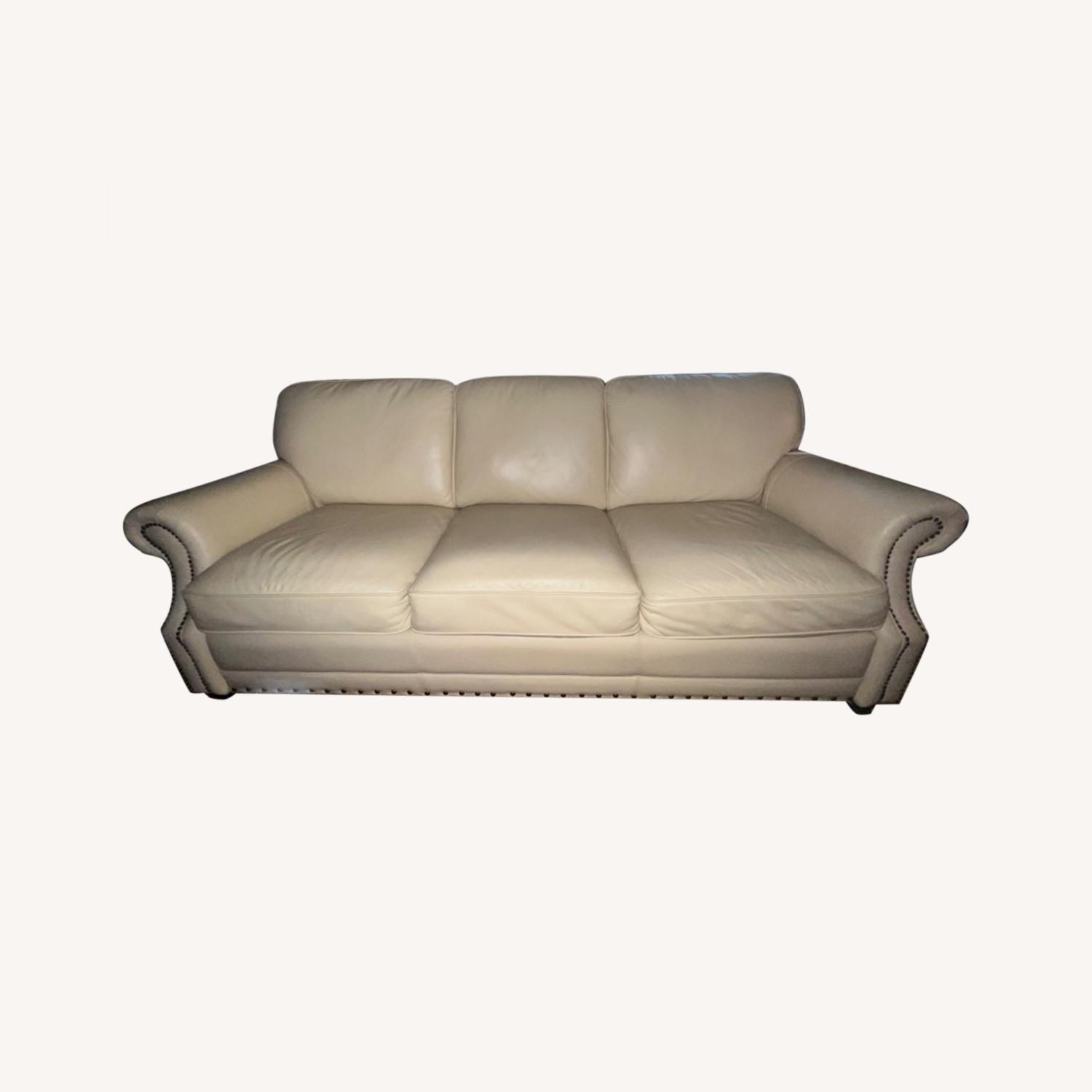 Jennifer Convertibles Three Seat Beige Leather Sofa AptDeco