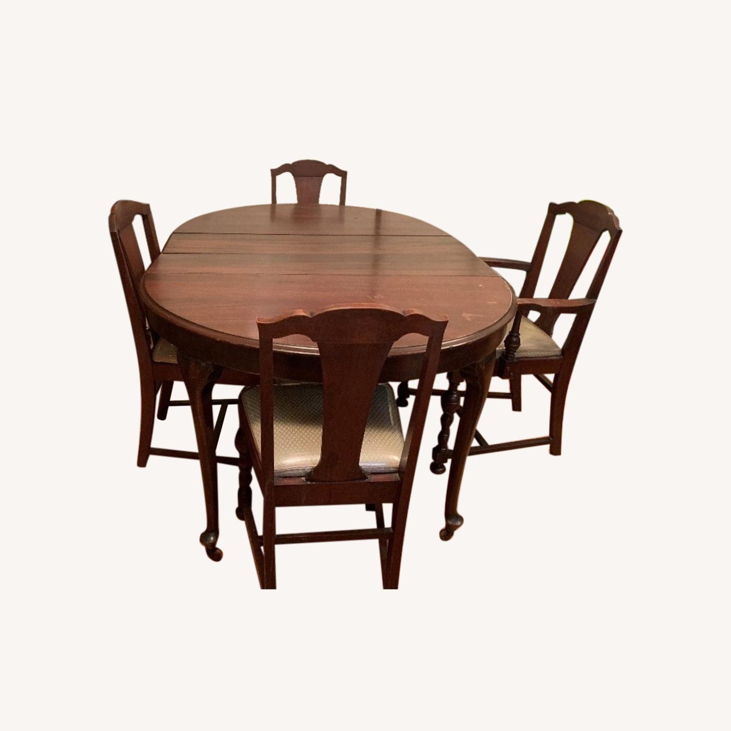 Vintage Cherry Wood Oval Dining Table & Chairs AptDeco