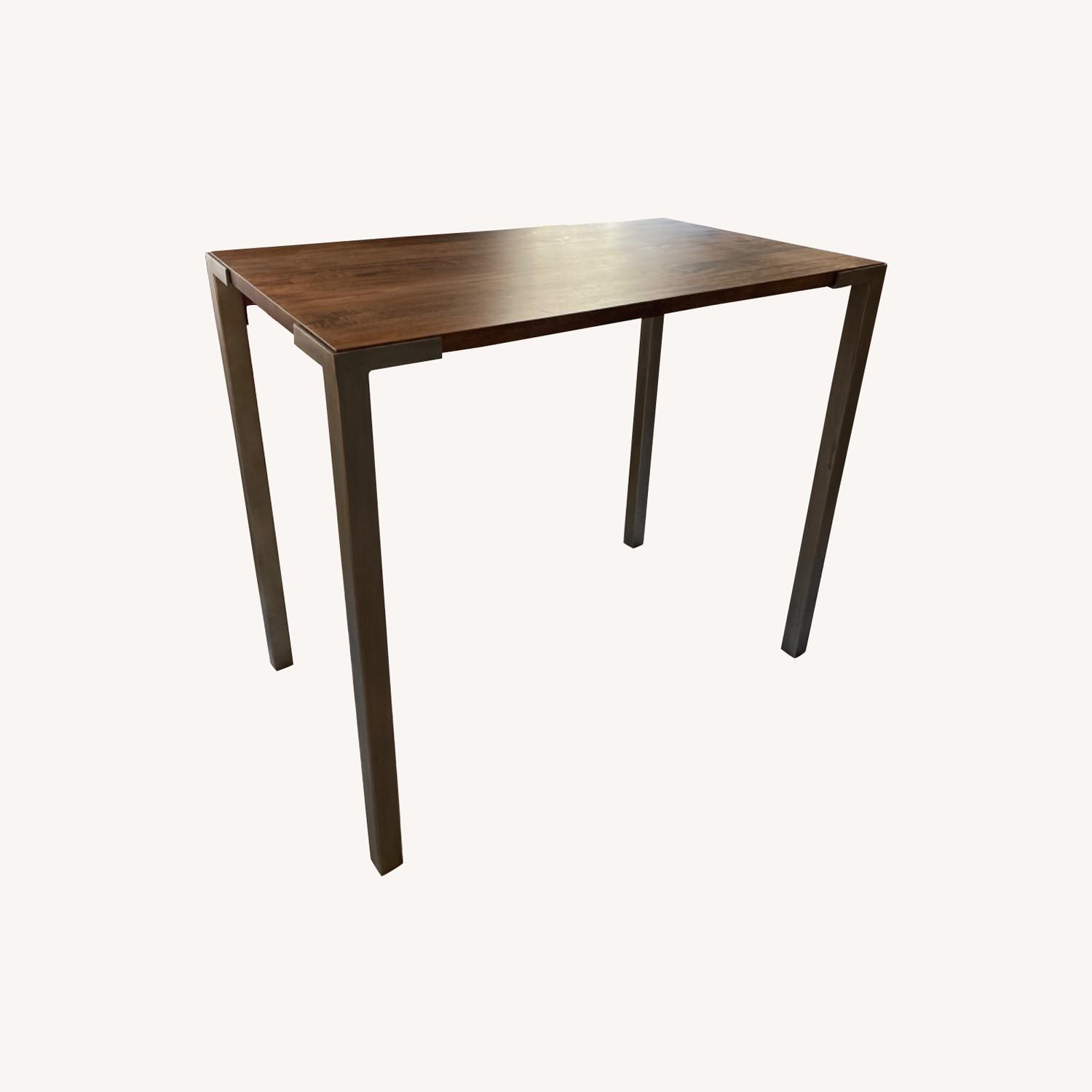CB2 Stilt BarHeight Dining Table AptDeco