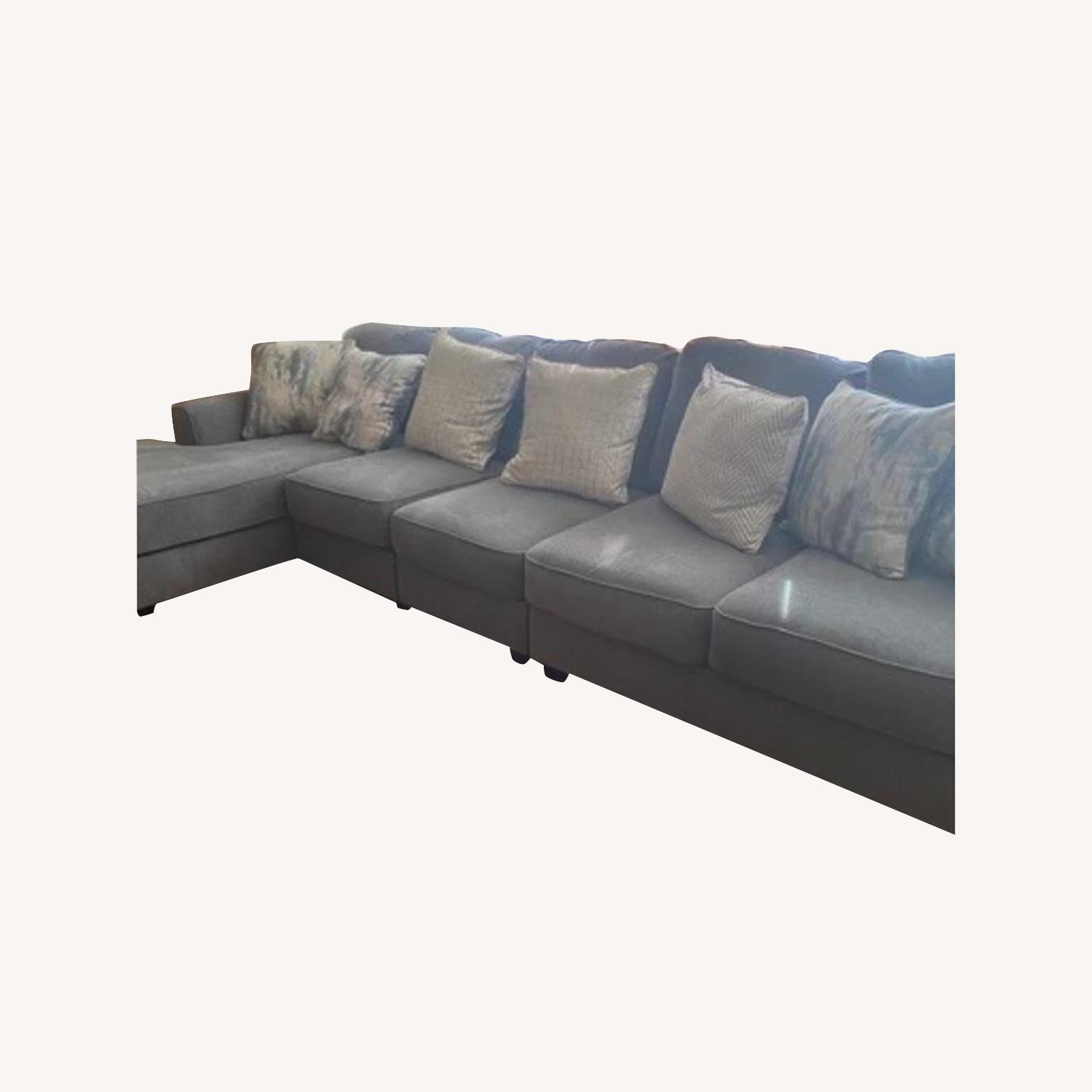 Ashley Casteno 5 Piece Sectional - image-0