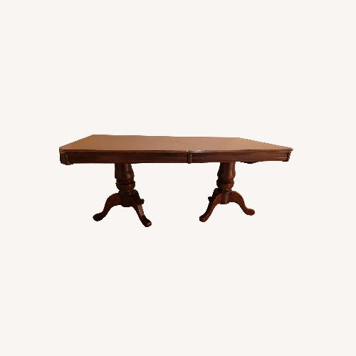 Used Furniture Depot Mahavira Double Pedestal Dining Table for sale on AptDeco