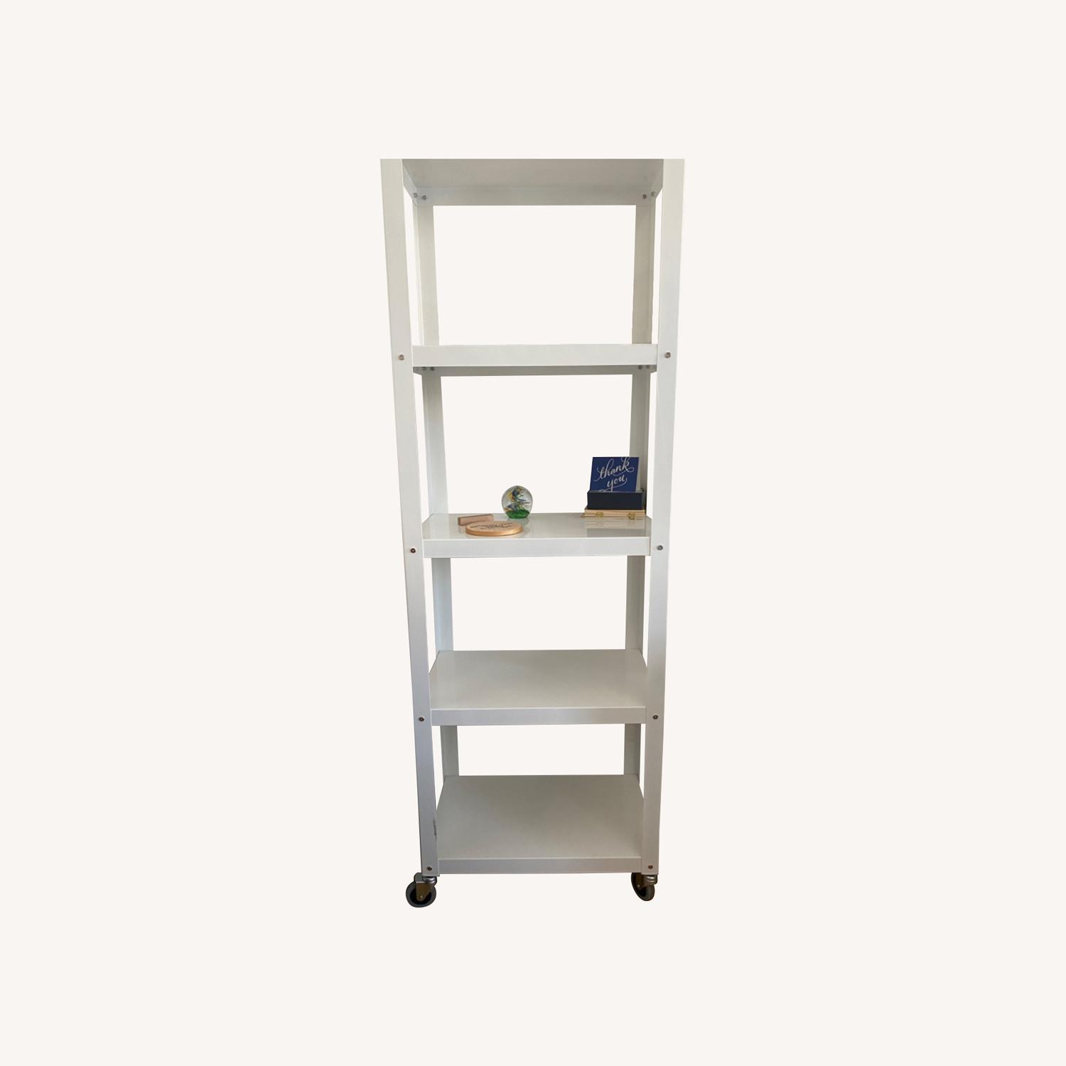 CB2 Rolling White Metal Bookshelf AptDeco