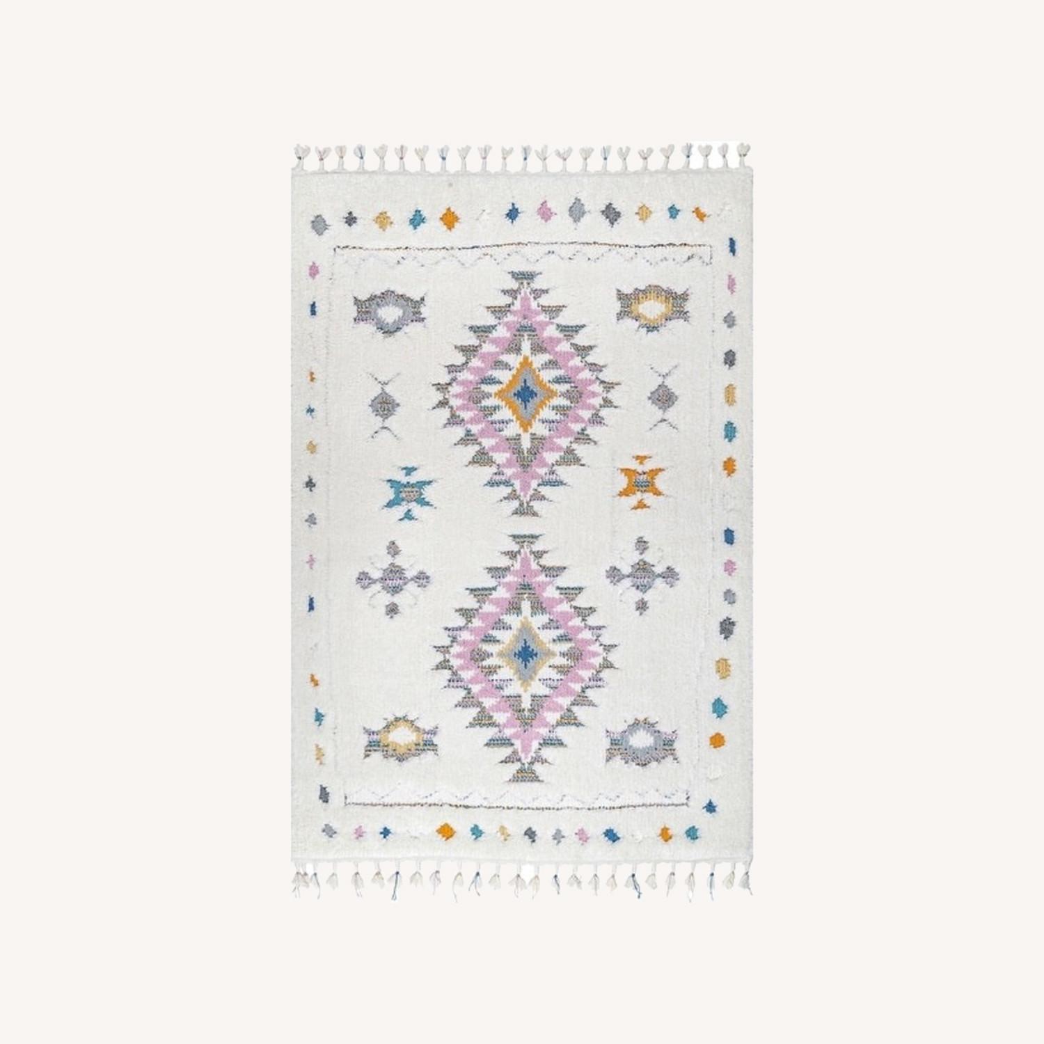 nuLOOM Bohemian Textured Tassel Shag Area Rug AptDeco