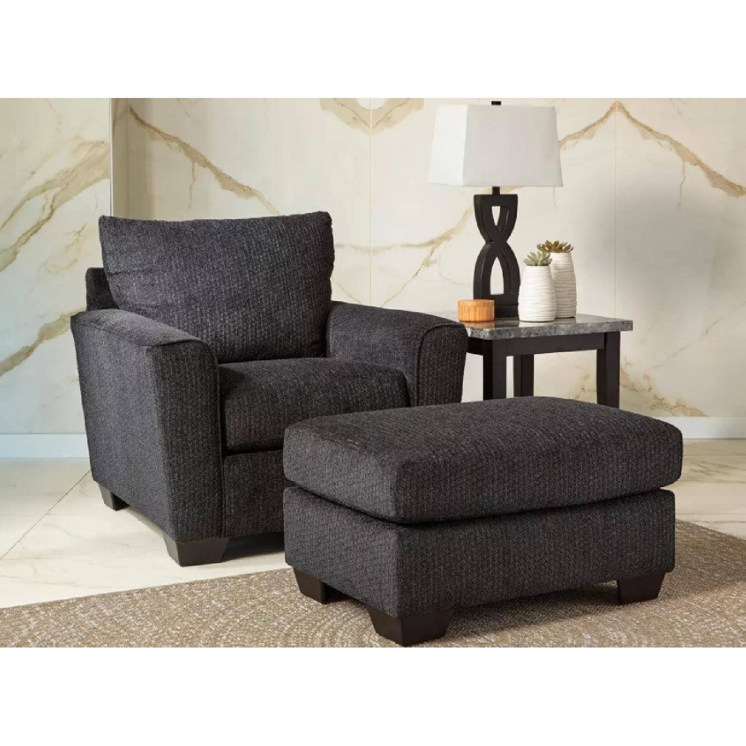 Raymour & Flanigan Chair and Ottoman Set AptDeco