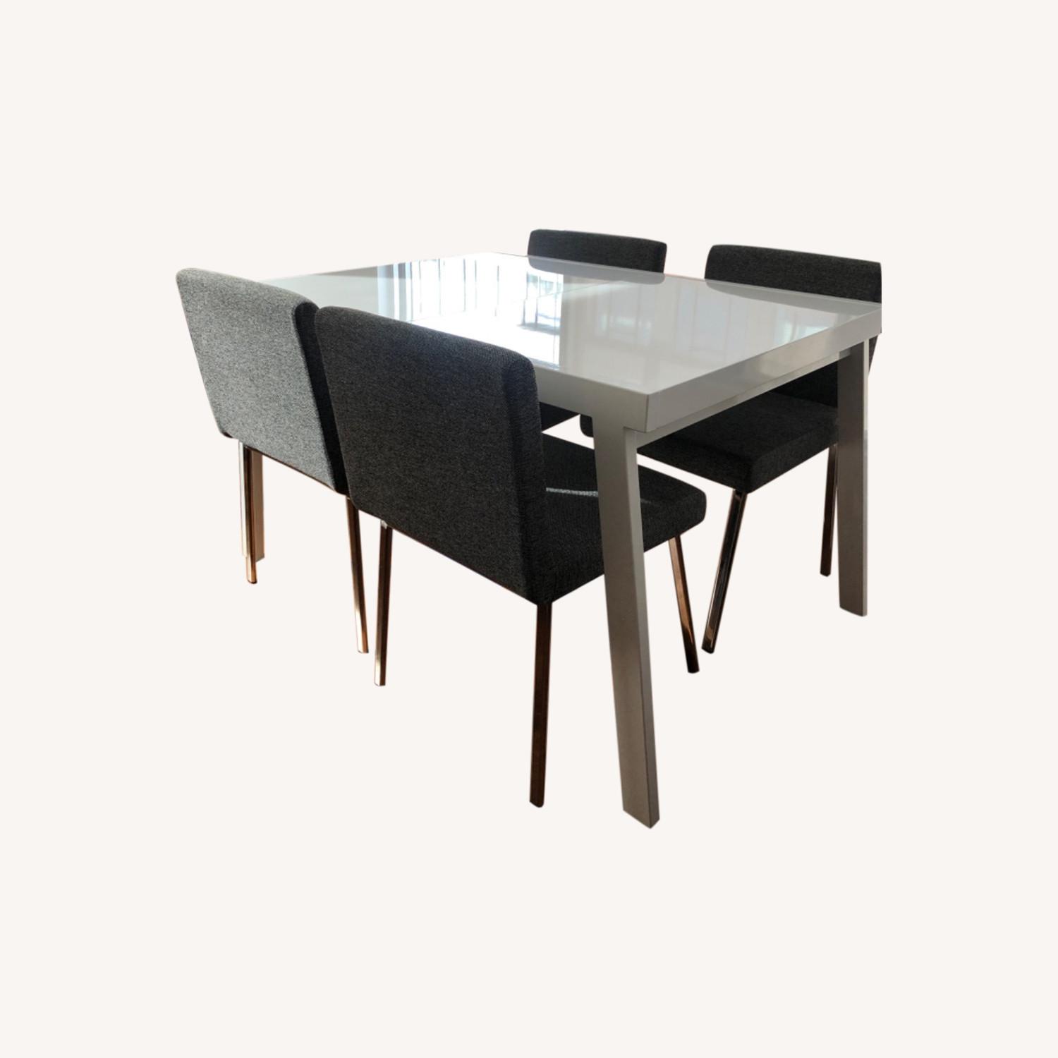 CB2 Slate Design White Lacquer Expandable Dining Table AptDeco