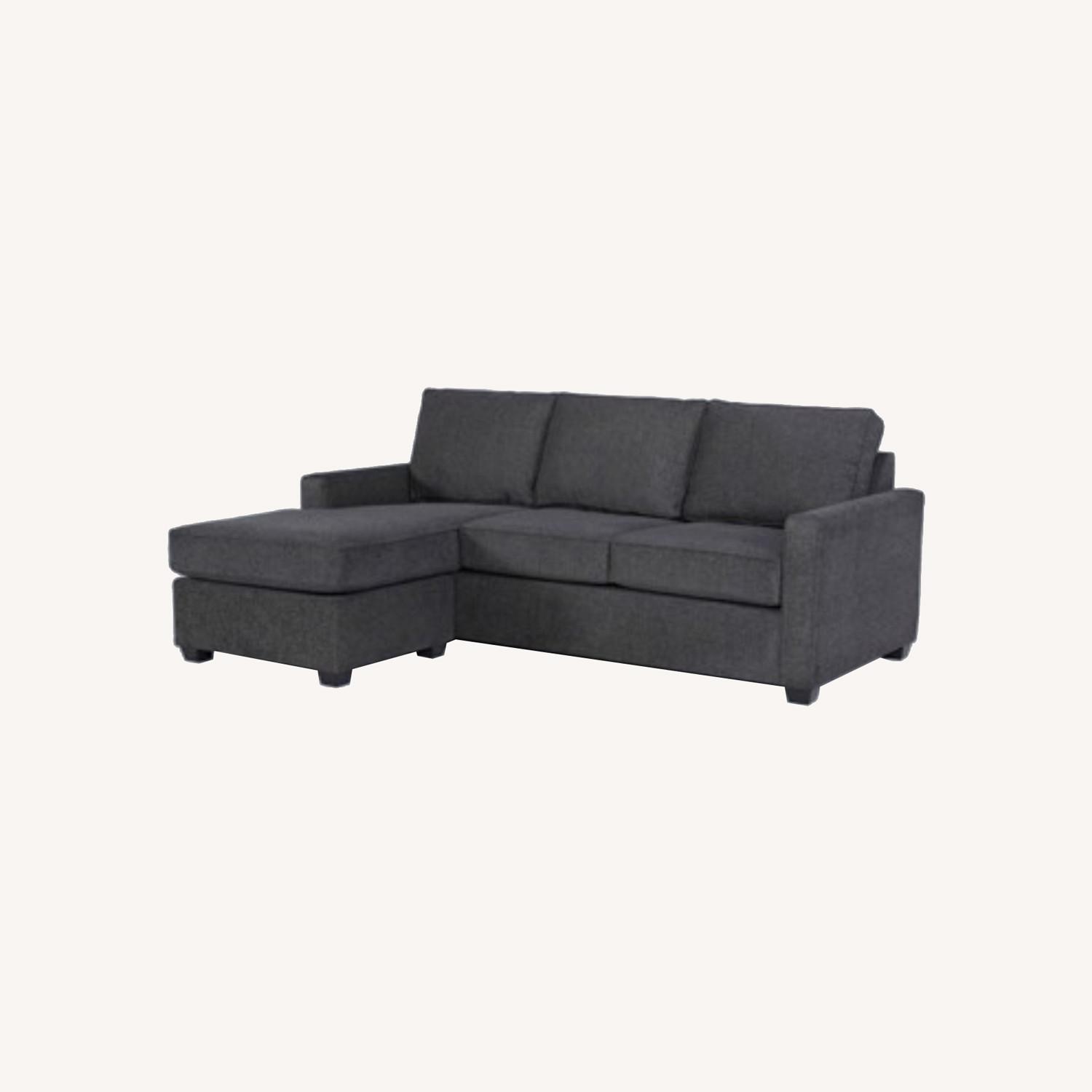 Living Spaces Sectional Sofa (Reversible Chasie) - image-0