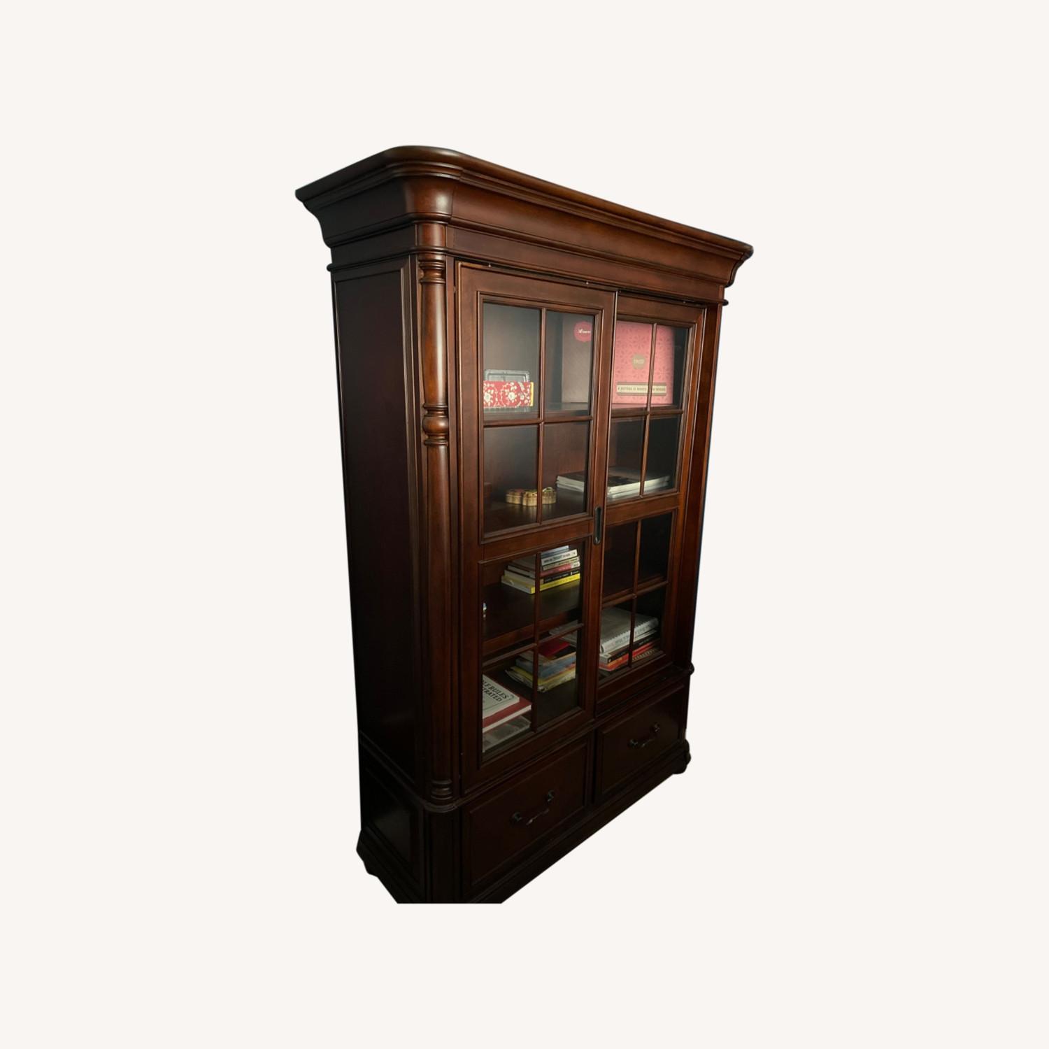 Raymour & Flanigan Slide Door Bookcase (Cherry) AptDeco