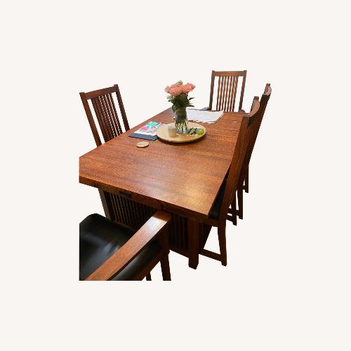 Used Wooden Brown Dining Table with 6 Matching Chairs for sale on AptDeco