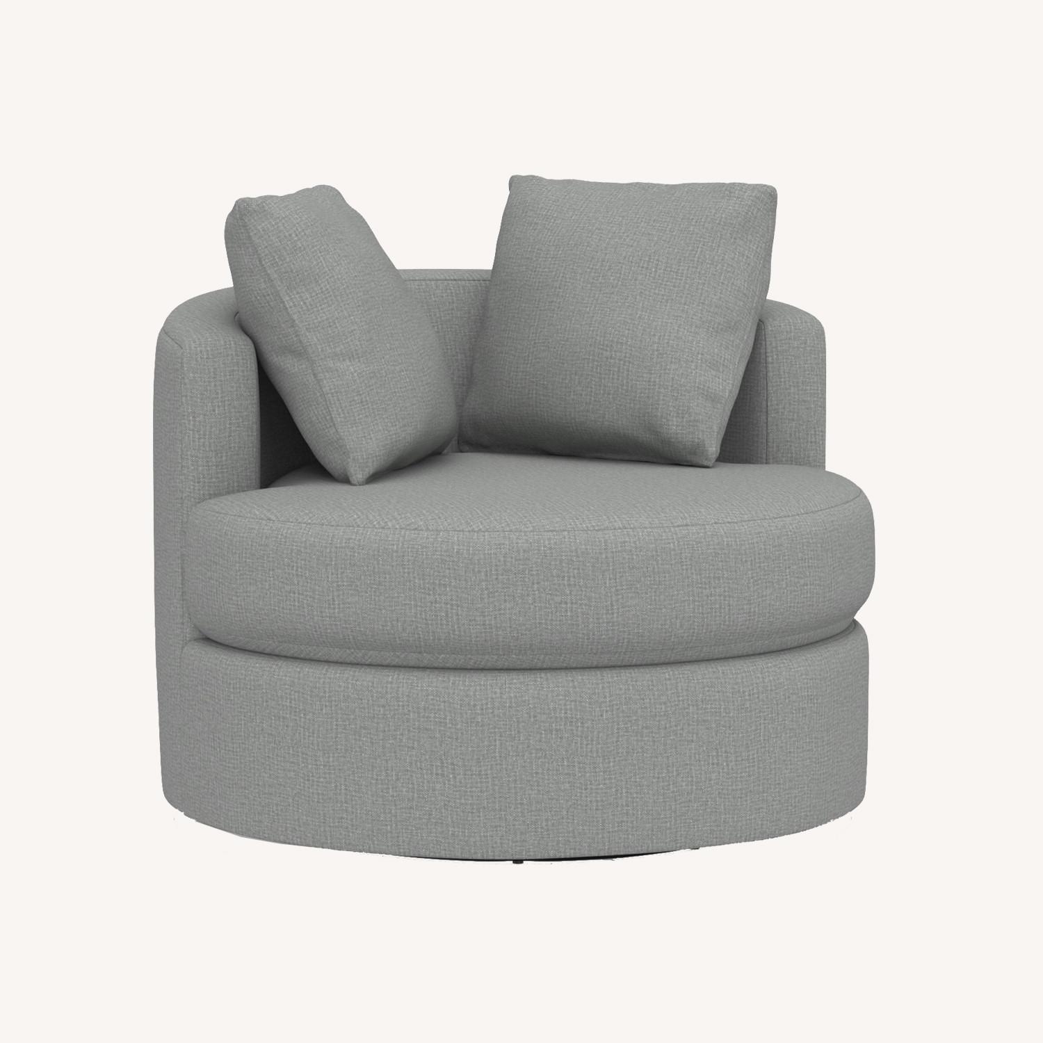 Pottery Barn Balboa Upholstered Swivel Armchair AptDeco