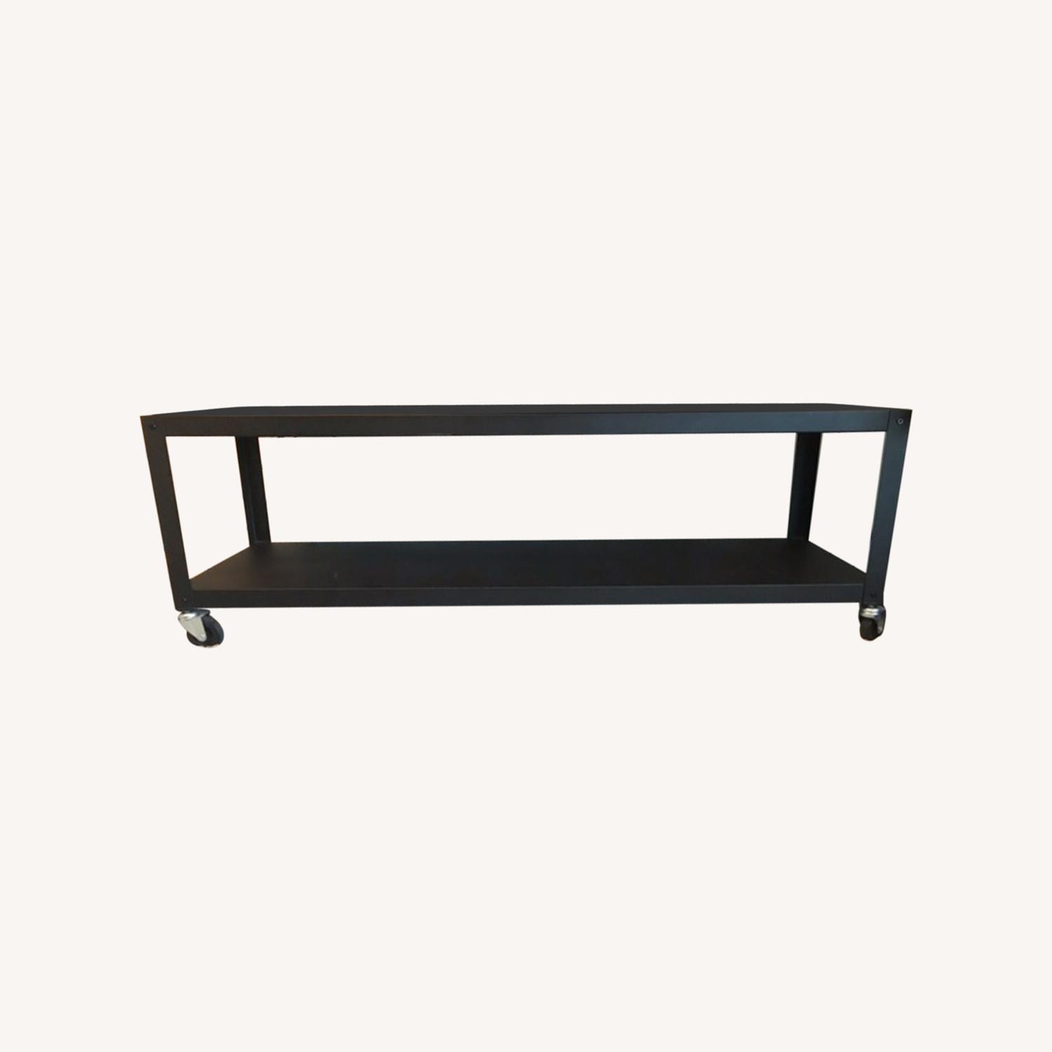 CB2 Black Rolling TV Stand AptDeco