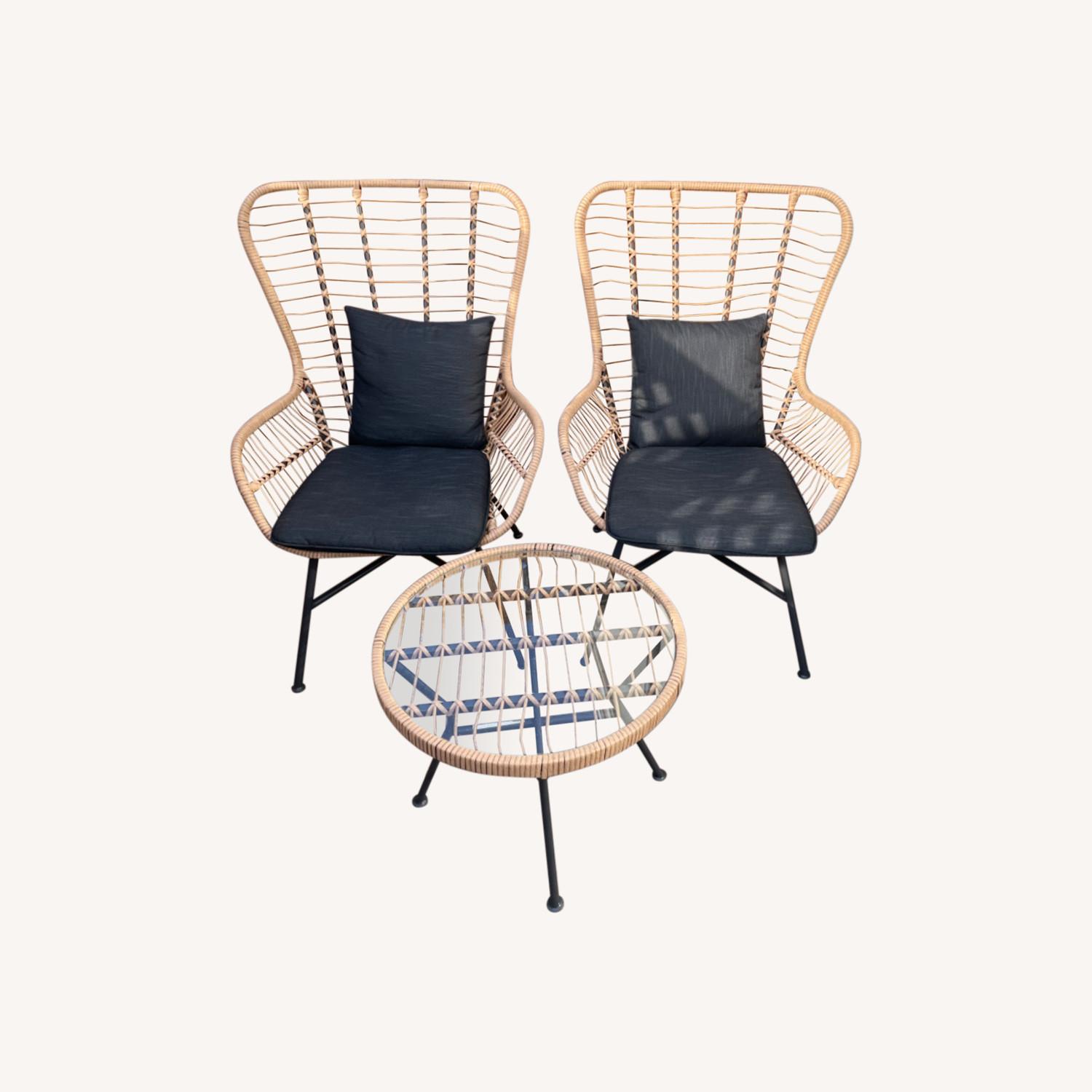 2Person Outdoor Seating with Cushions and a Table AptDeco