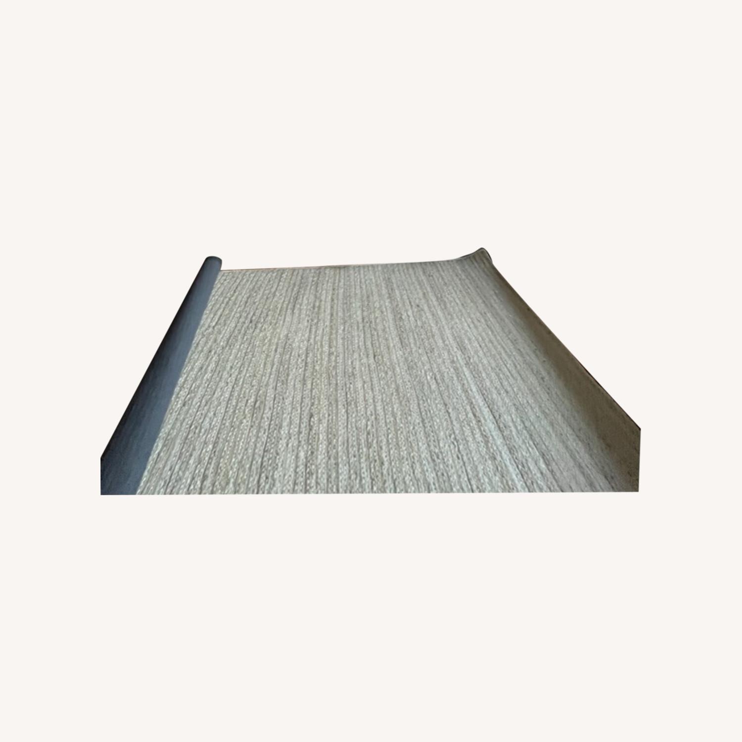 Pottery barn 5x7 natural braided jute rug AptDeco