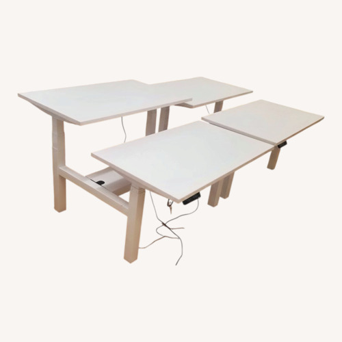 Used 4-Top Poppin Adjustable Standing Desk for sale on AptDeco
