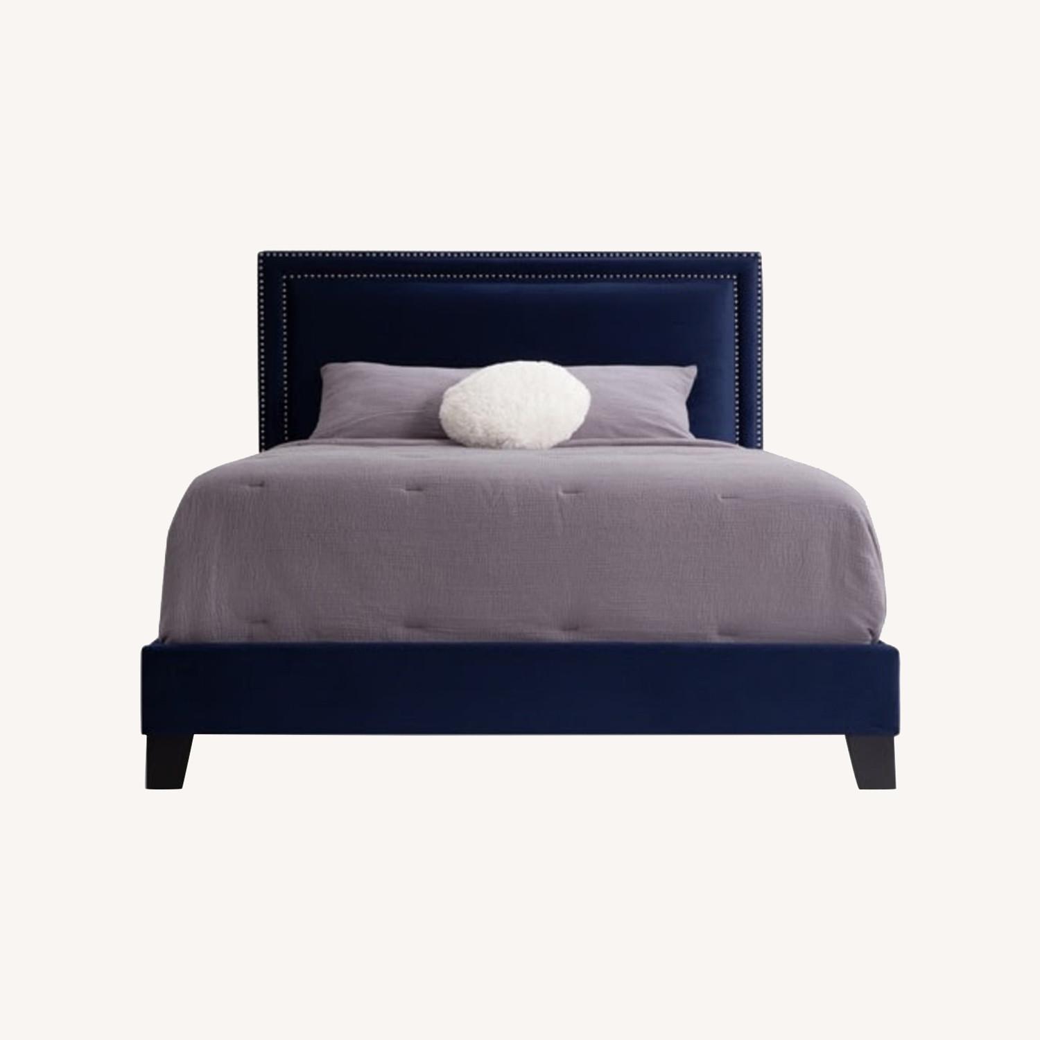 Tremont Queen Navy Upholstered Bed AptDeco