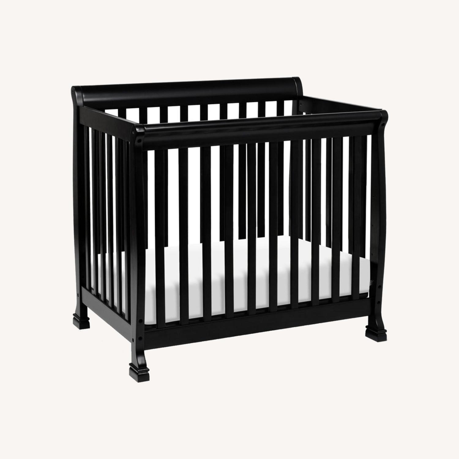 DaVinci Kalani 4in1 Convertible Mini Crib AptDeco