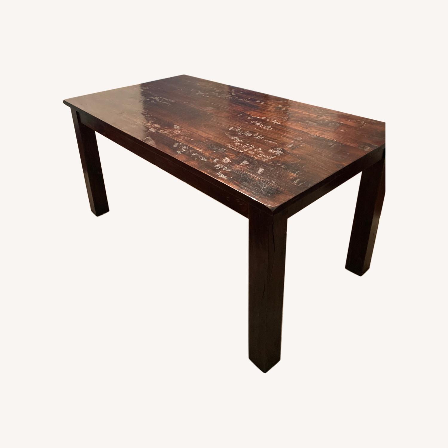 Pottery Barn Dark Wood Distressed Dining Table - image-0