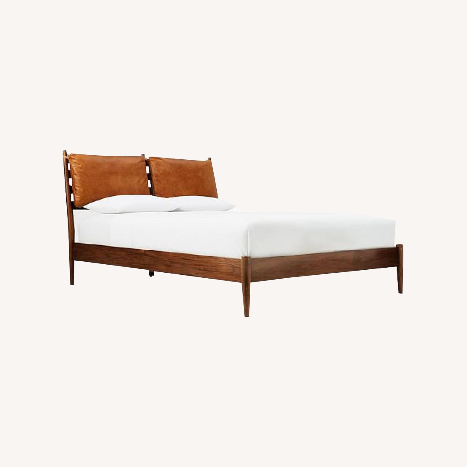 West Elm Arne Bed with Leather Pillows AptDeco