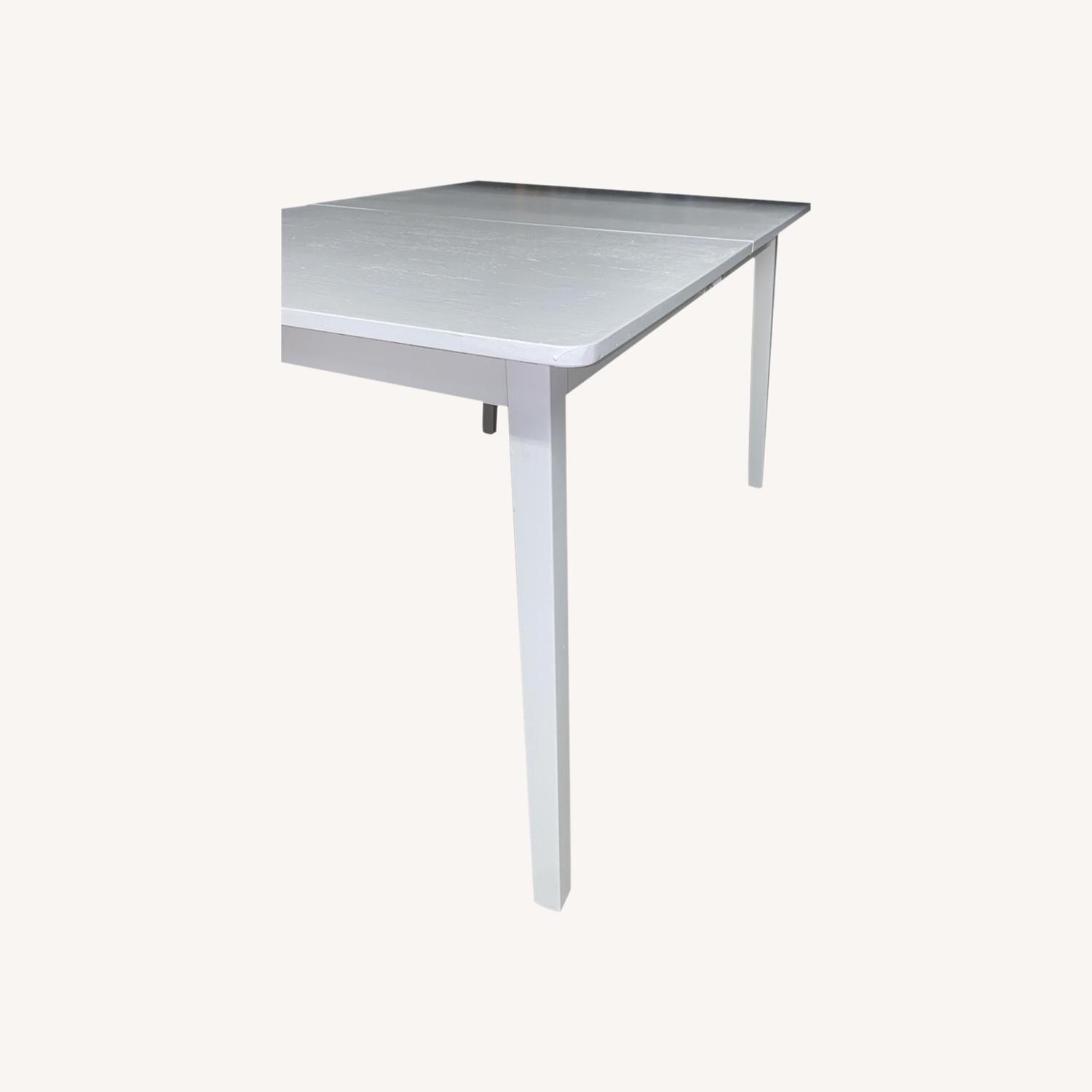 Dinning Table with Extensions - image-0