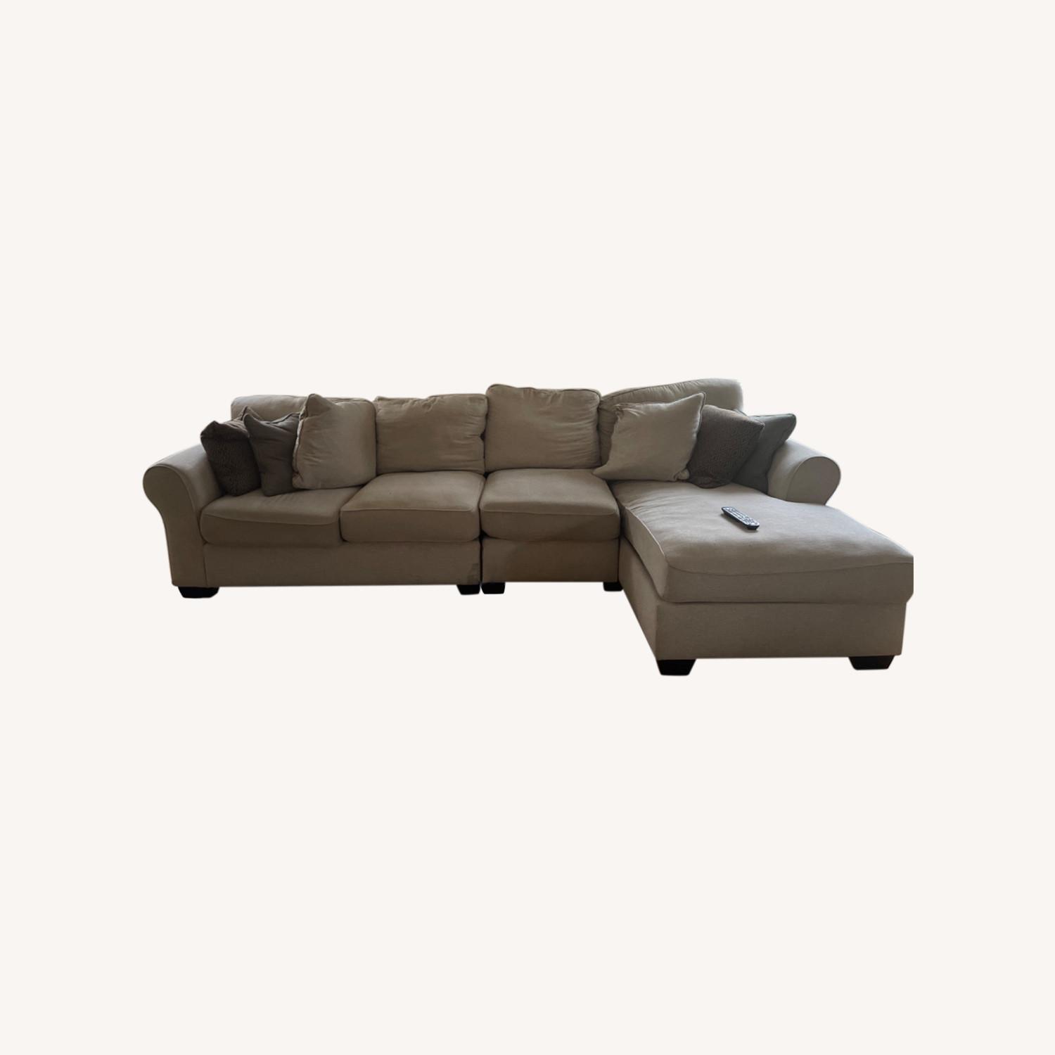 Ashley Furniture Beige Sectional Sofa with Chaise AptDeco